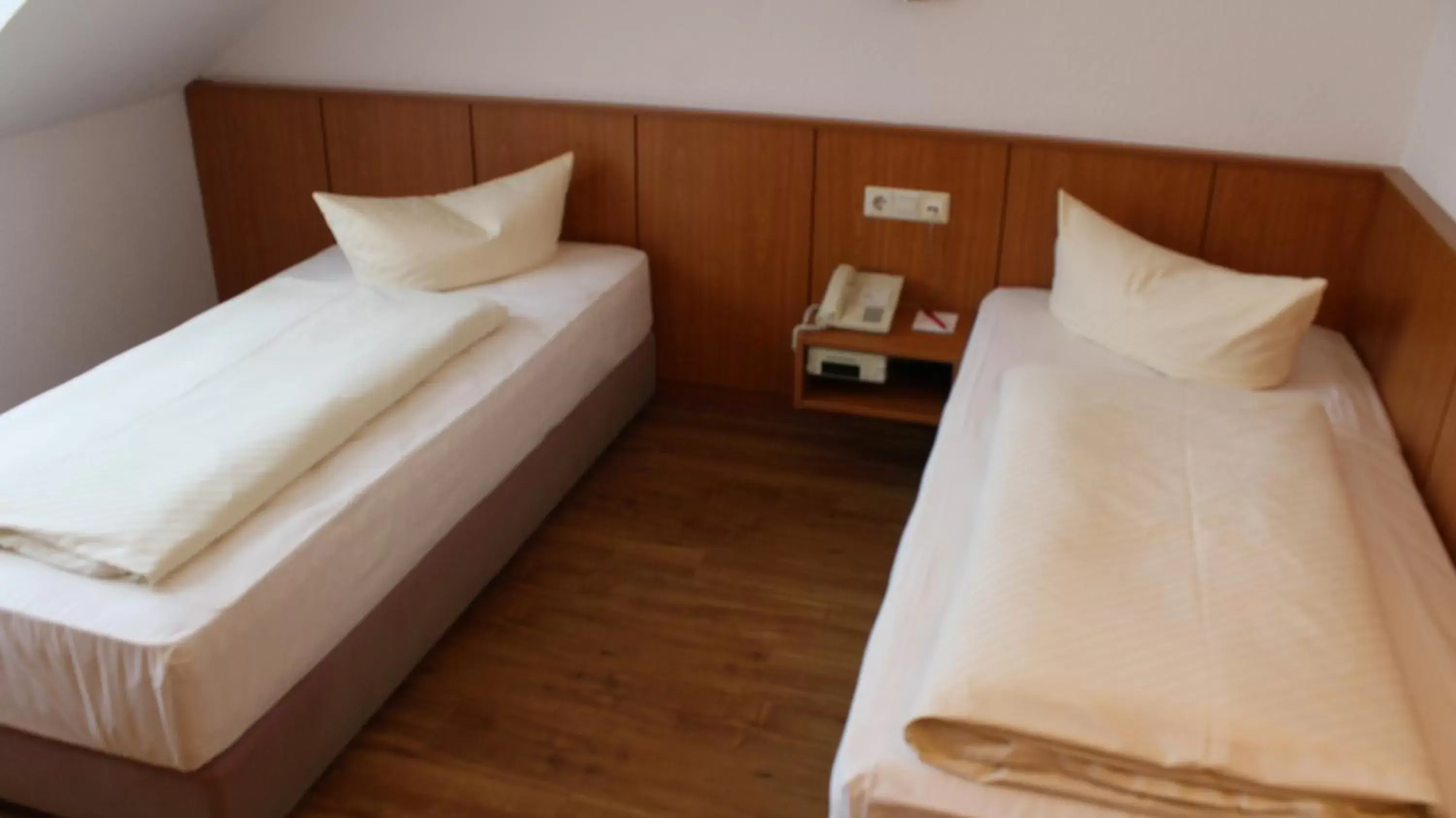 Bed in Hotel Weisser Schwan