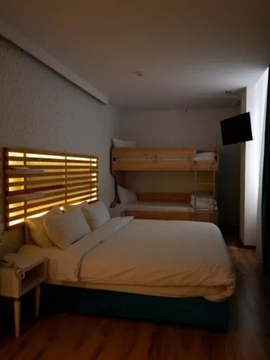 Bed in Athenian Montaza Hotel