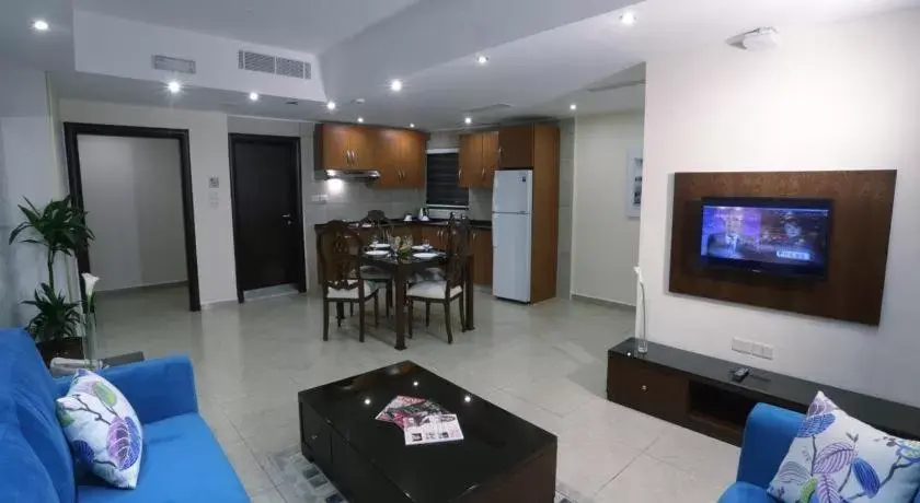 TV/Entertainment Center in City Rose Hotel Suites