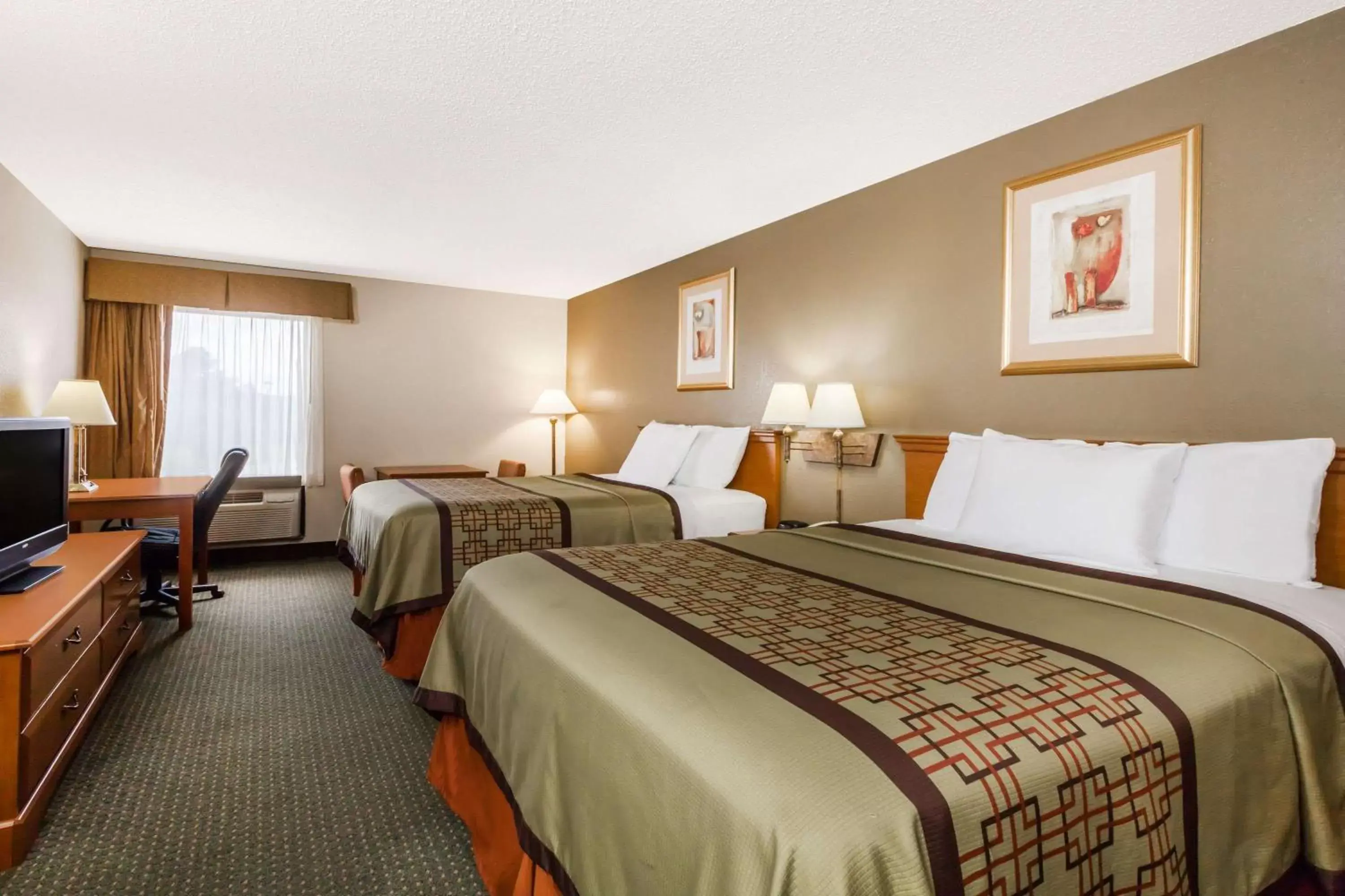 Photo of the whole room, Bed in Days Inn & Suites by Wyndham New Iberia