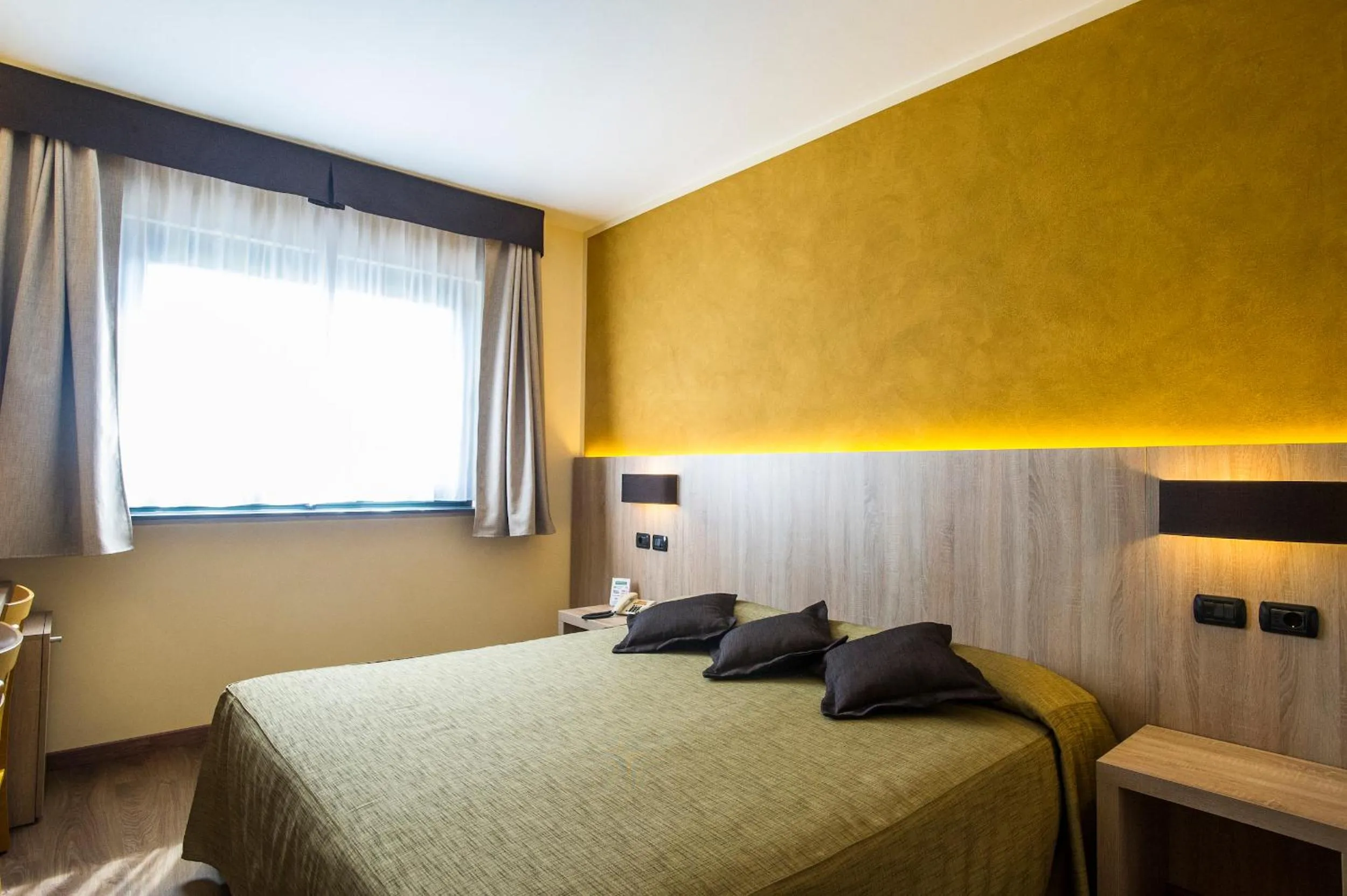 Bed in Sangallo Park Hotel