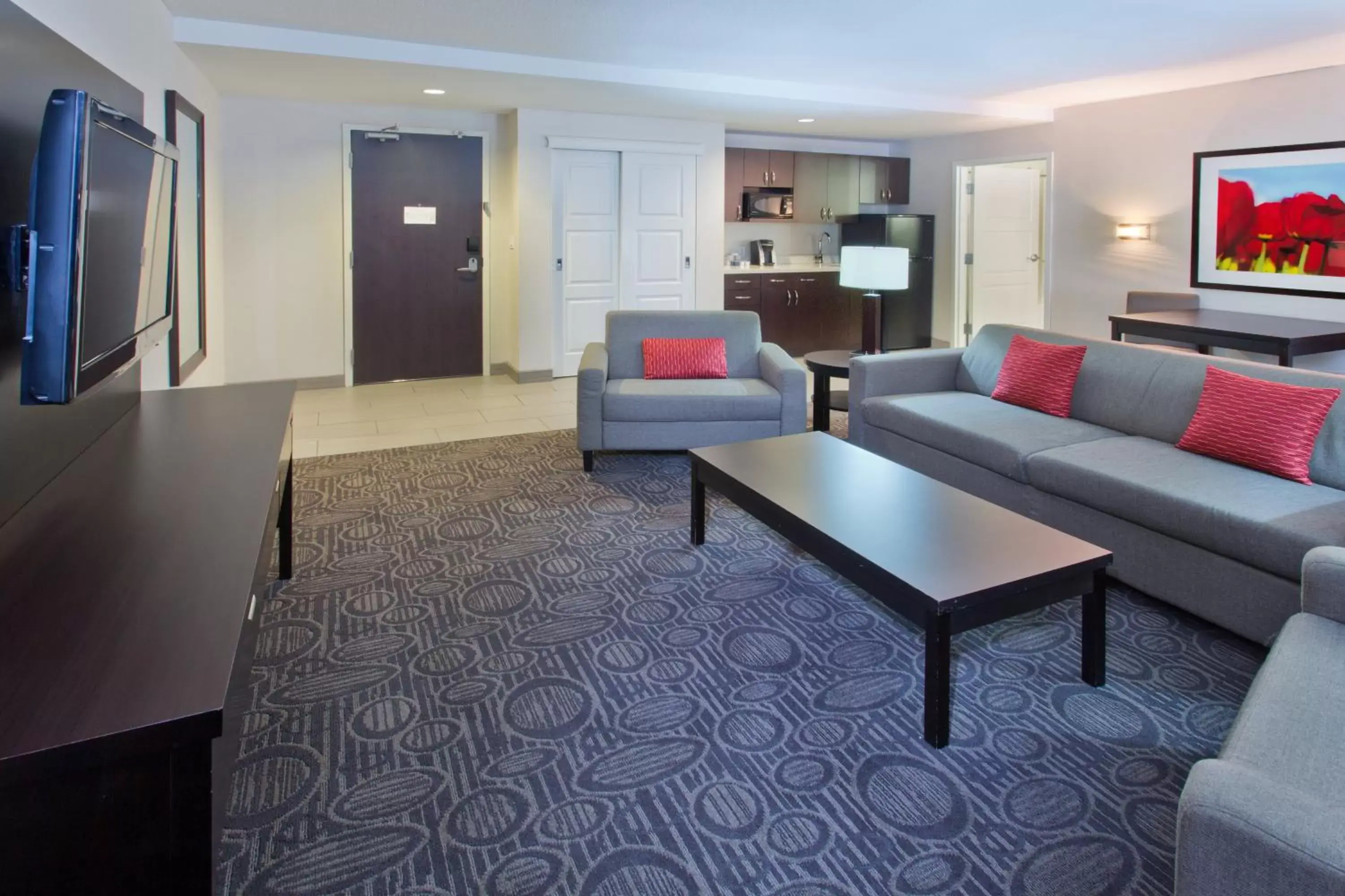 Photo of the whole room, Seating Area in Holiday Inn Hotel & Suites Red Deer, an IHG Hotel