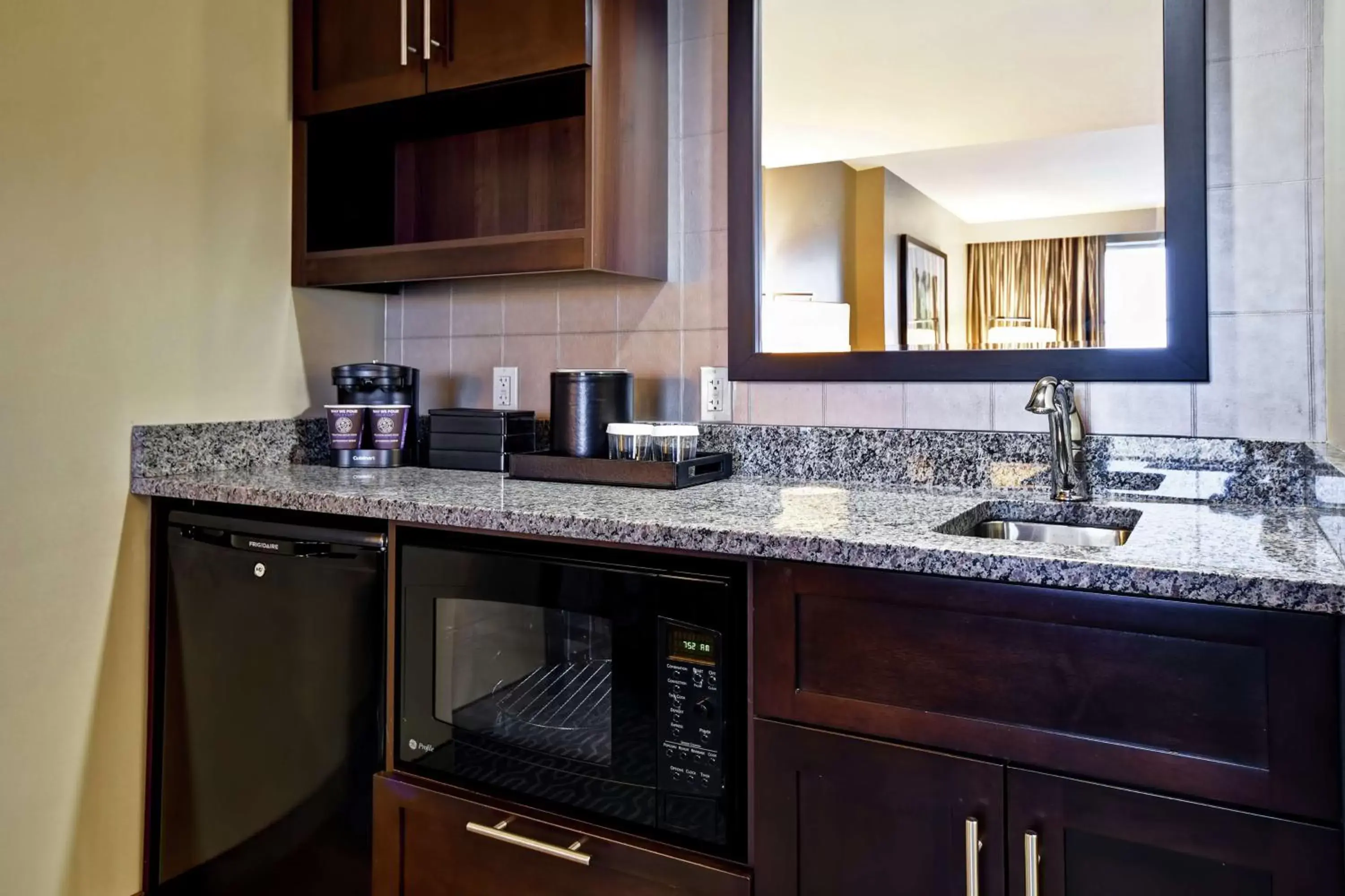 Kitchen or kitchenette, Bathroom in Embassy Suites Springfield