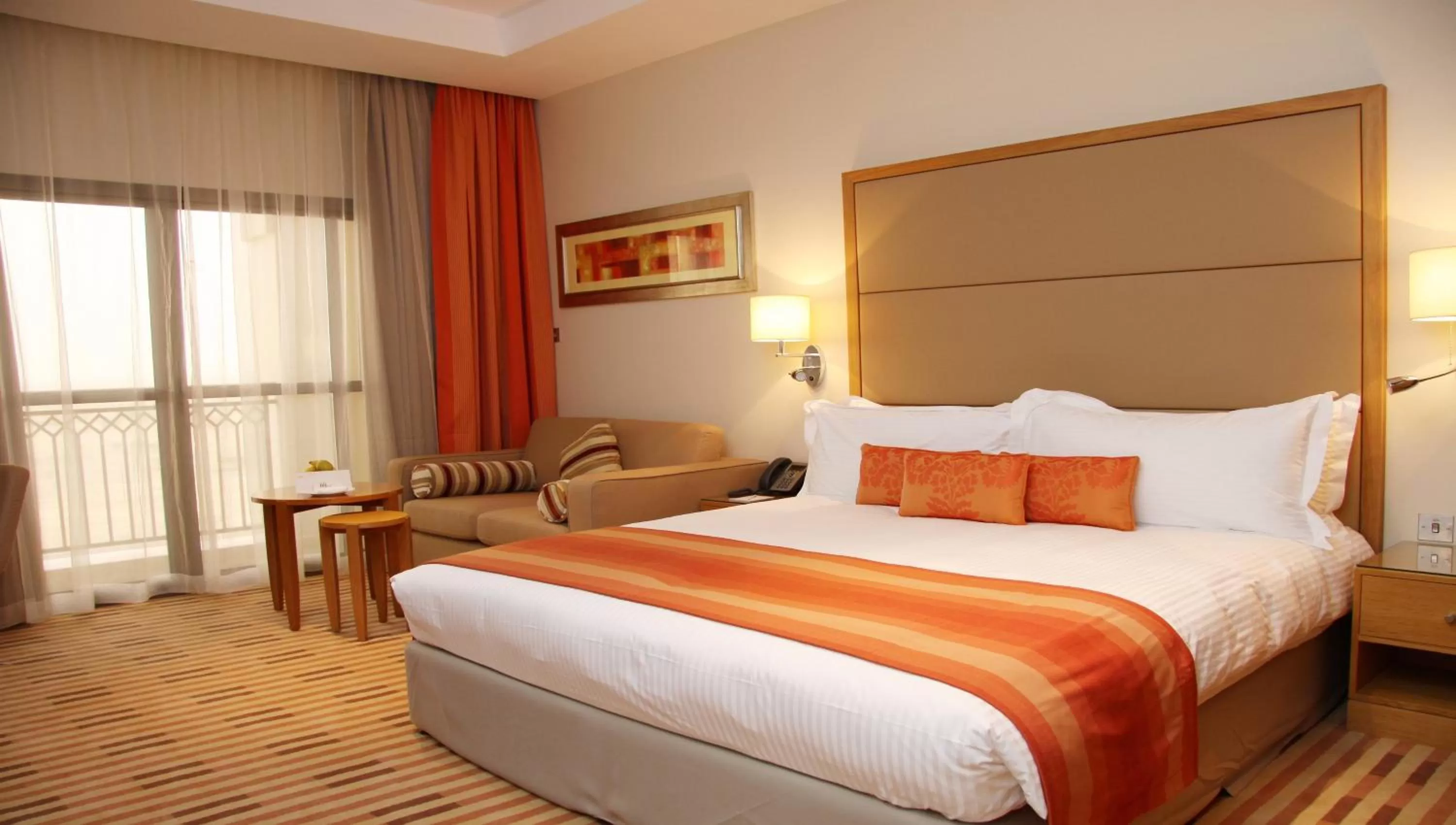 Photo of the whole room, Bed in Crowne Plaza Sohar by IHG
