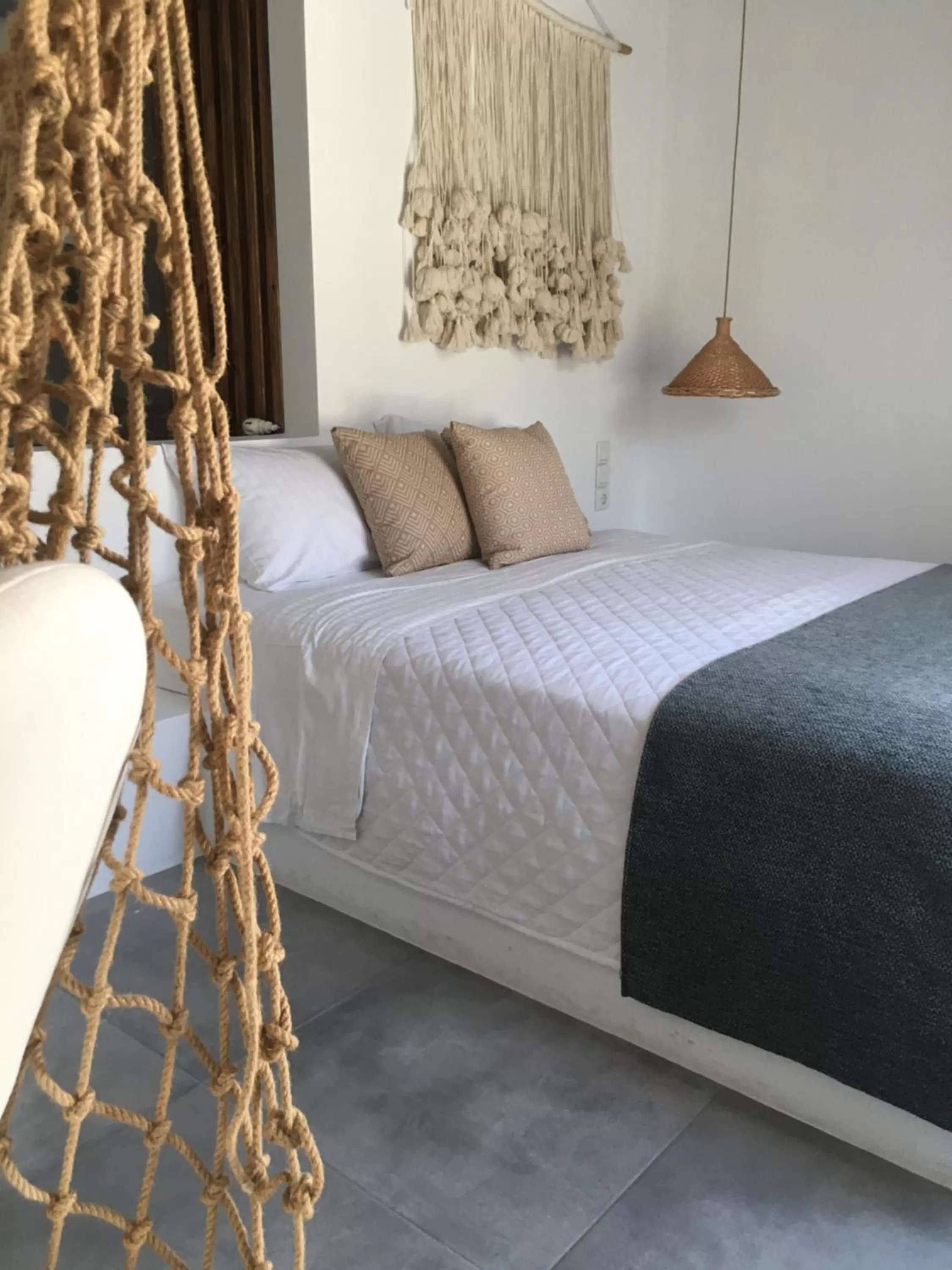 Bed in AELLIA HOTEL & SUITES LEROS