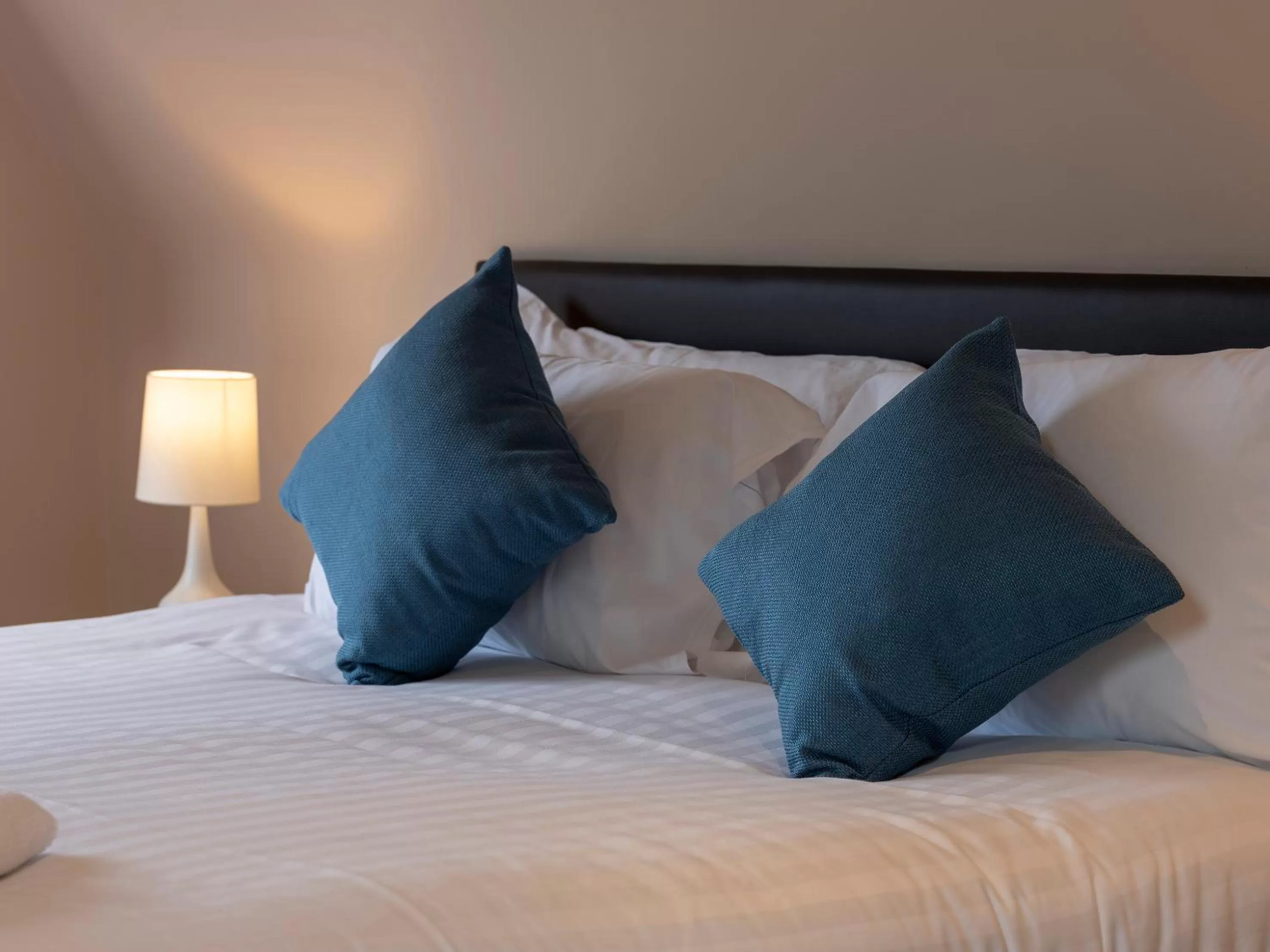 Bed in The Poltimore Inn