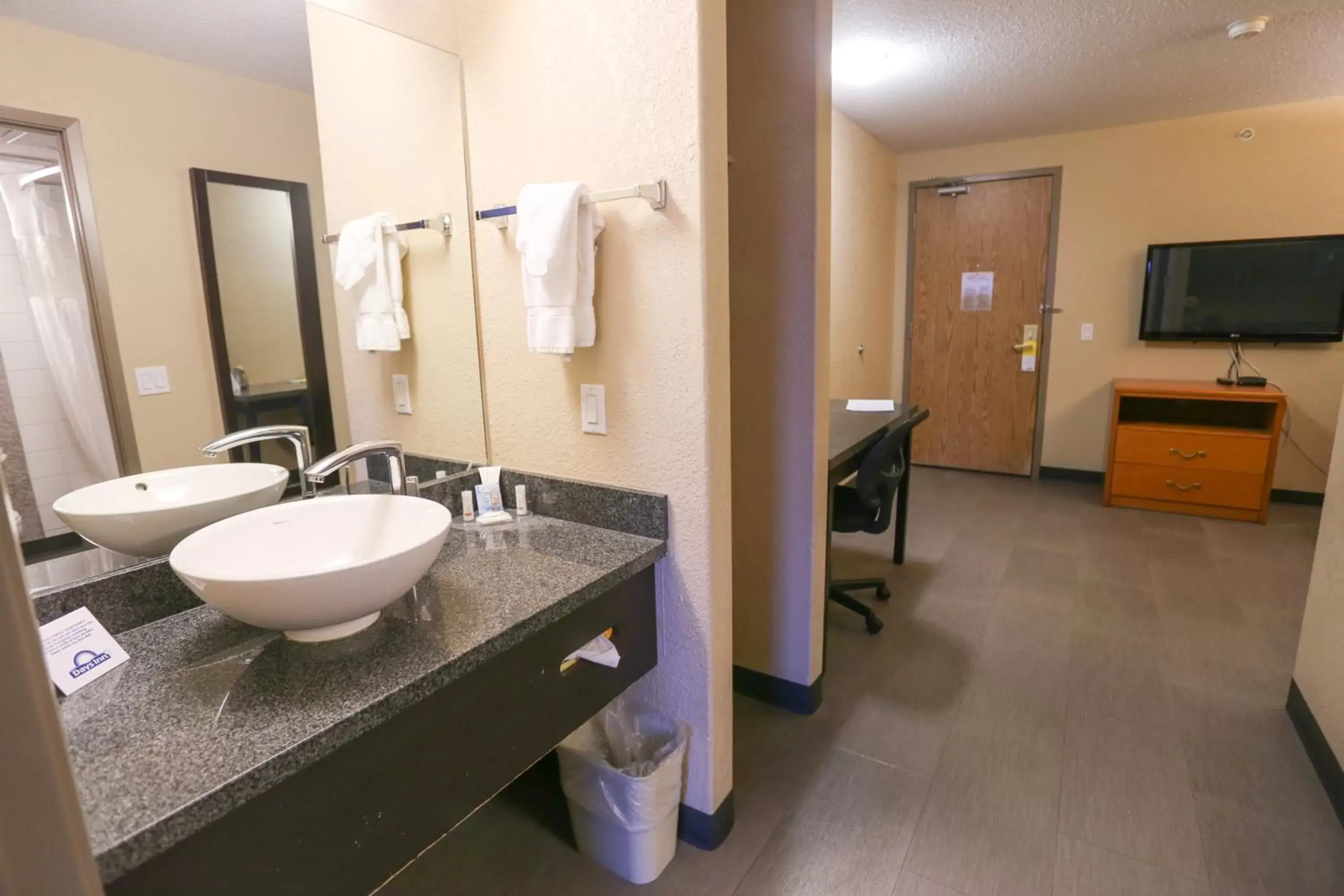 Bathroom in Days Inn by Wyndham Calgary Airport