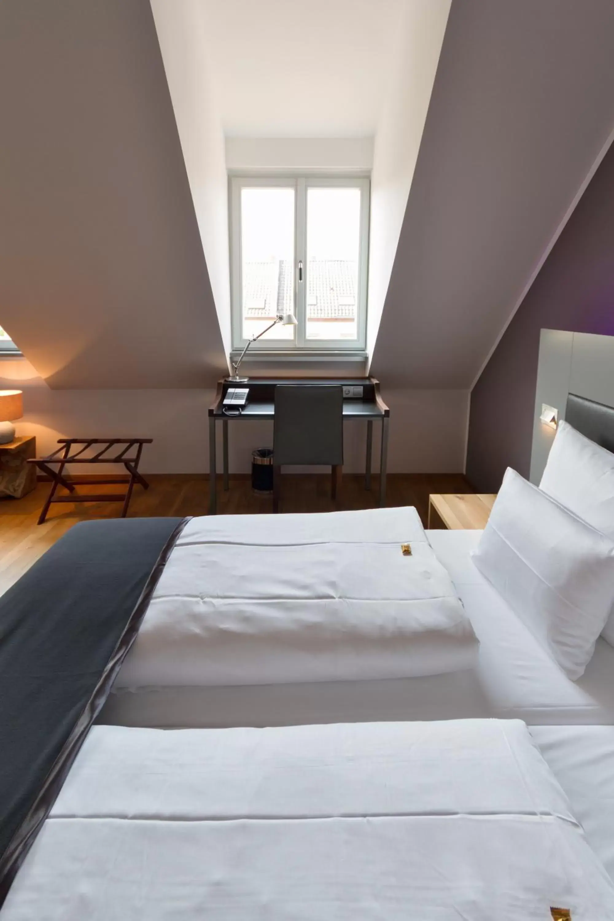 Photo of the whole room, Bed in Qube Hotel Bergheim