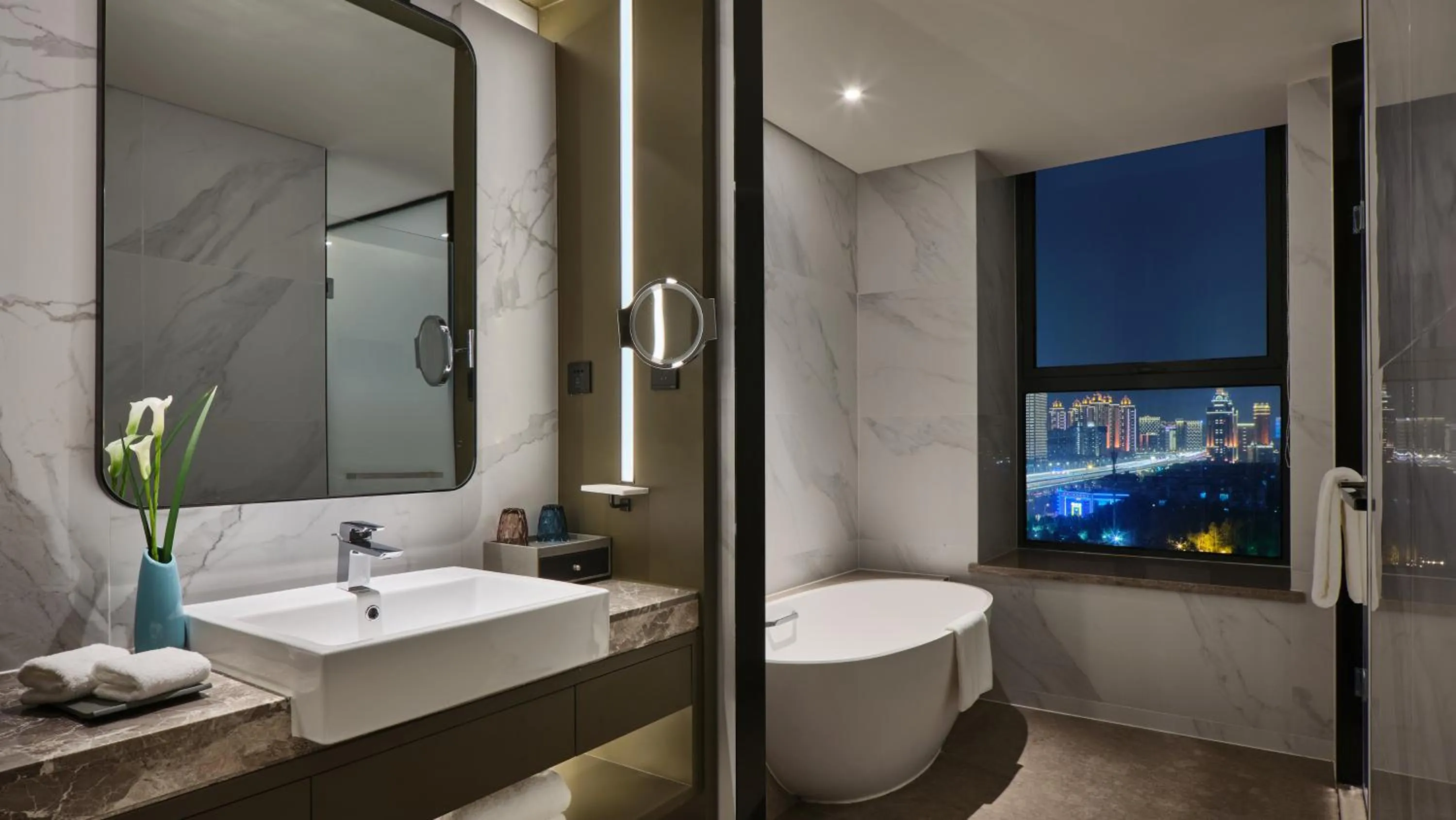 Shower in Crowne Plaza Wuhan Development Zone by IHG