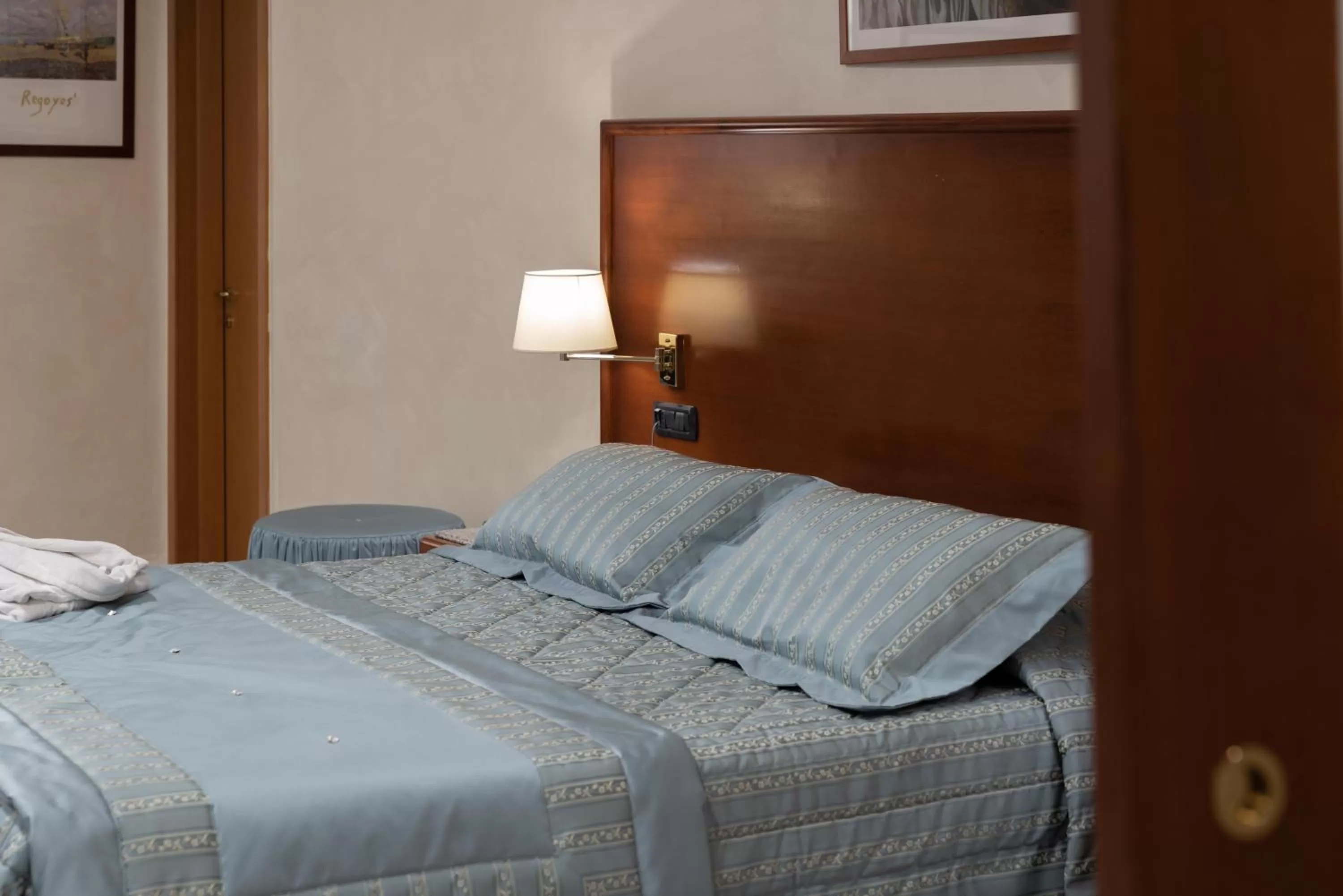 Bed in Edra Palace Hotel & Ristorante