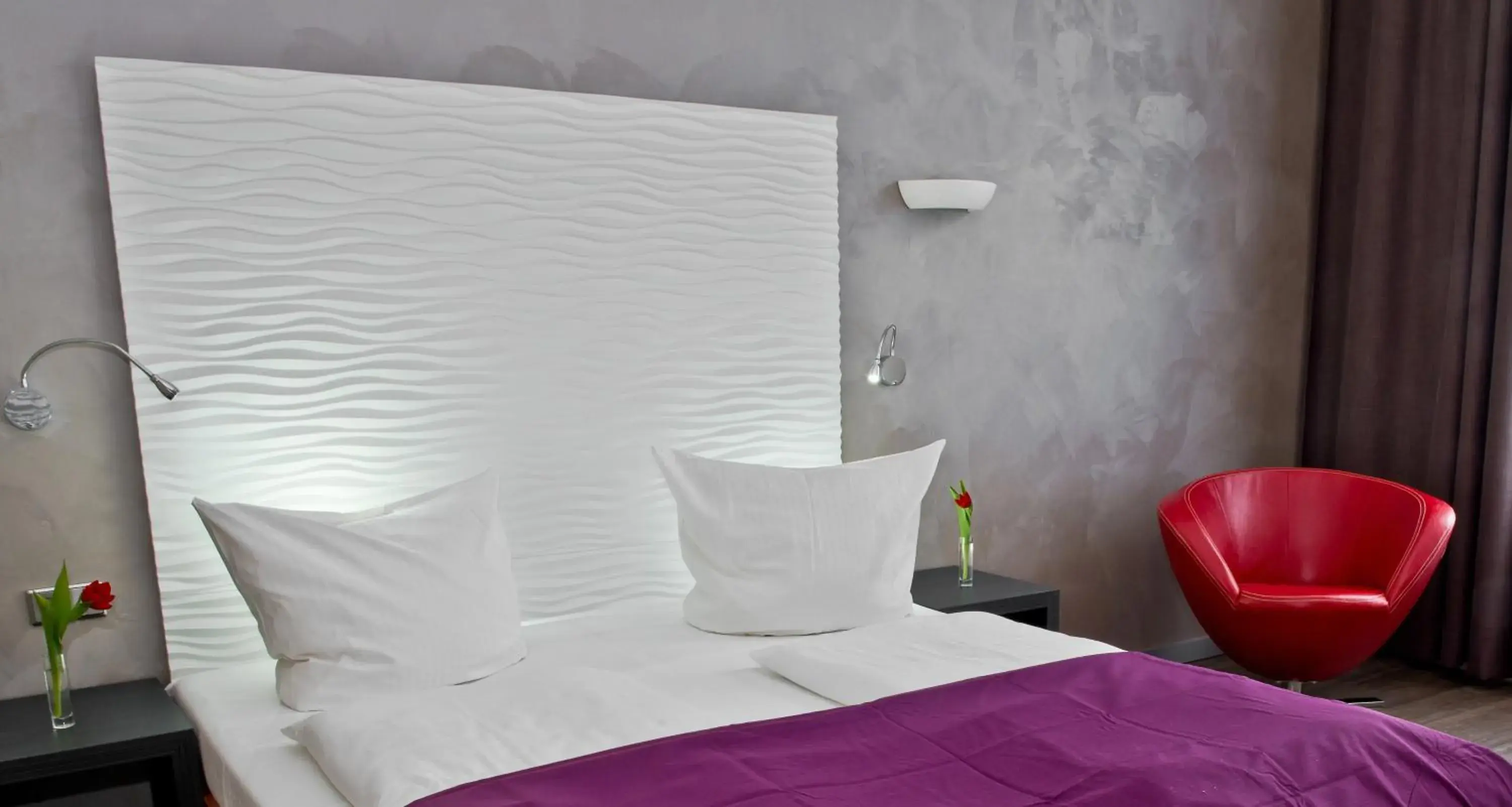 Bed in Artim Hotel