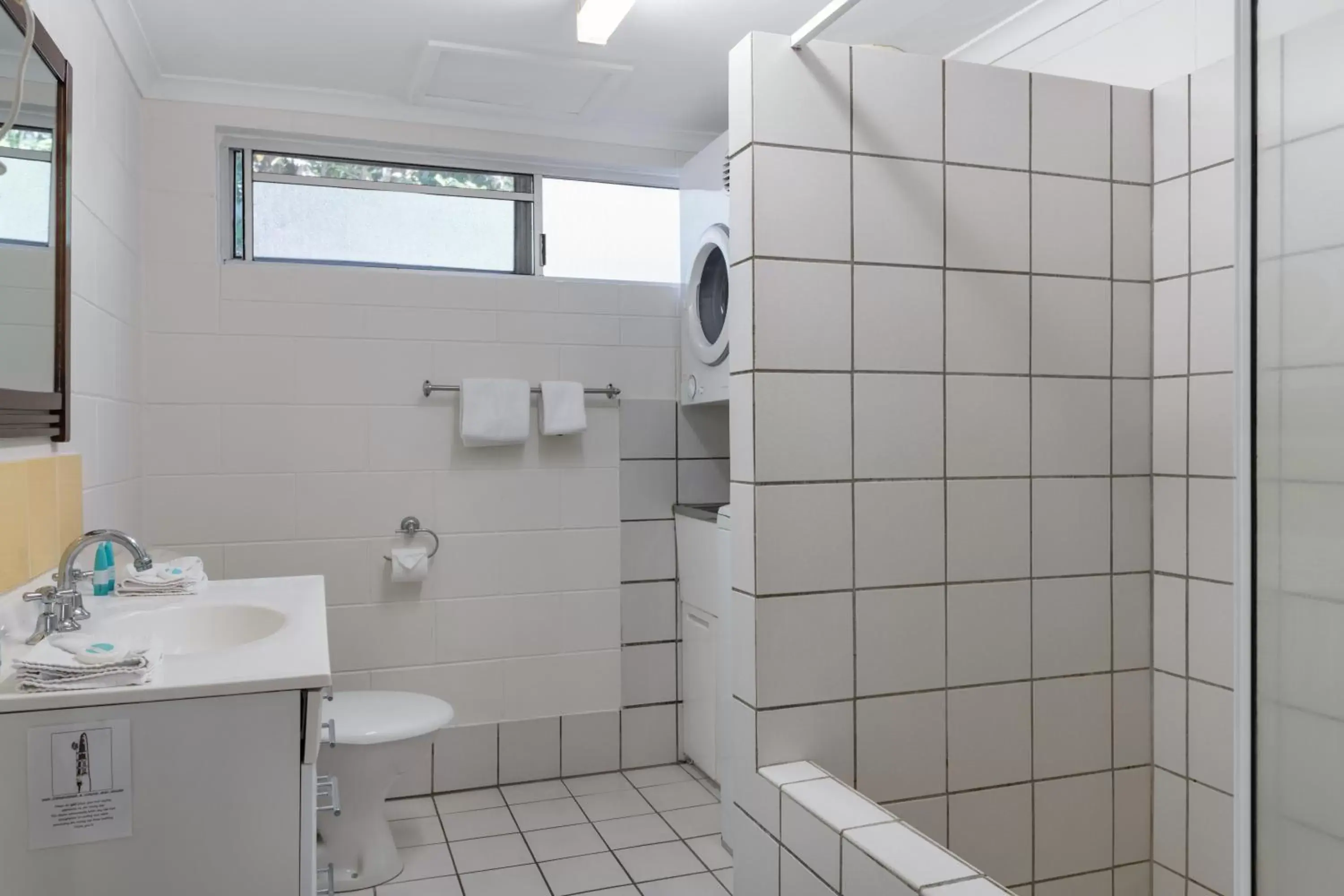 Bathroom in Lychee Tree Holiday Apartments