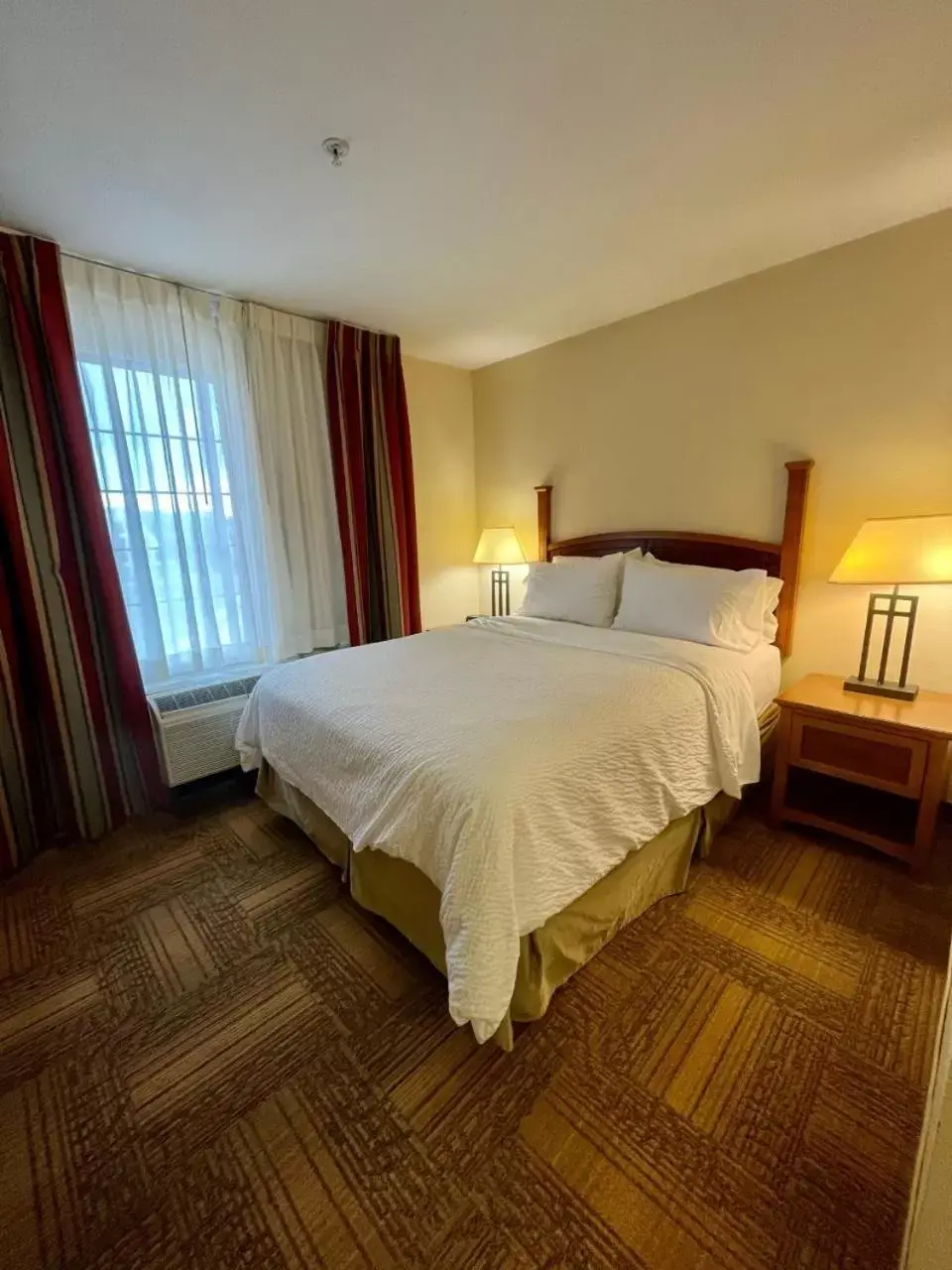 Bed in Staybridge Suites Houston - Willowbrook, an IHG Hotel