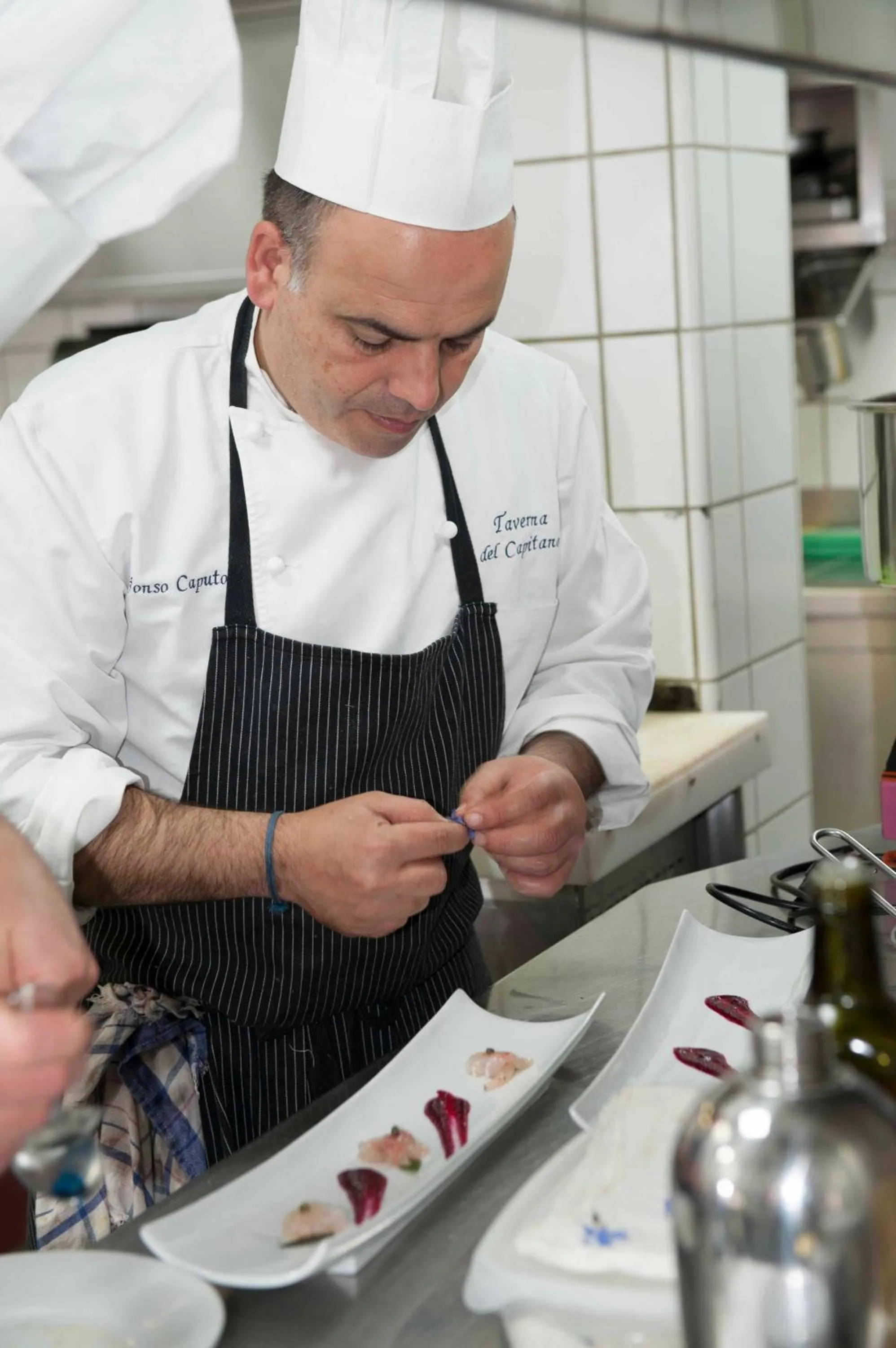 Staff in Taverna Del Capitano
