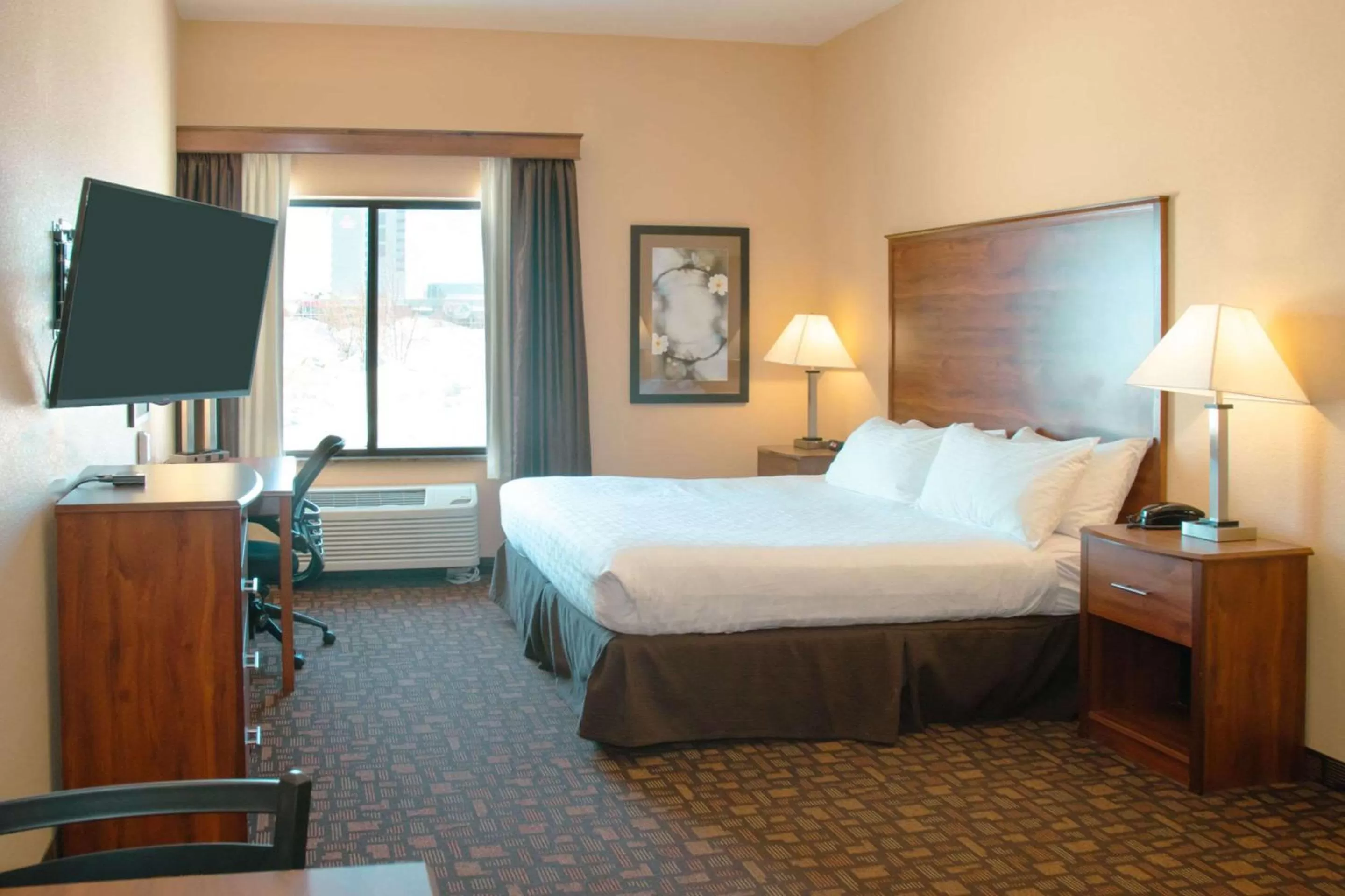 Bedroom, Bed in Expressway Suites of Grand Forks