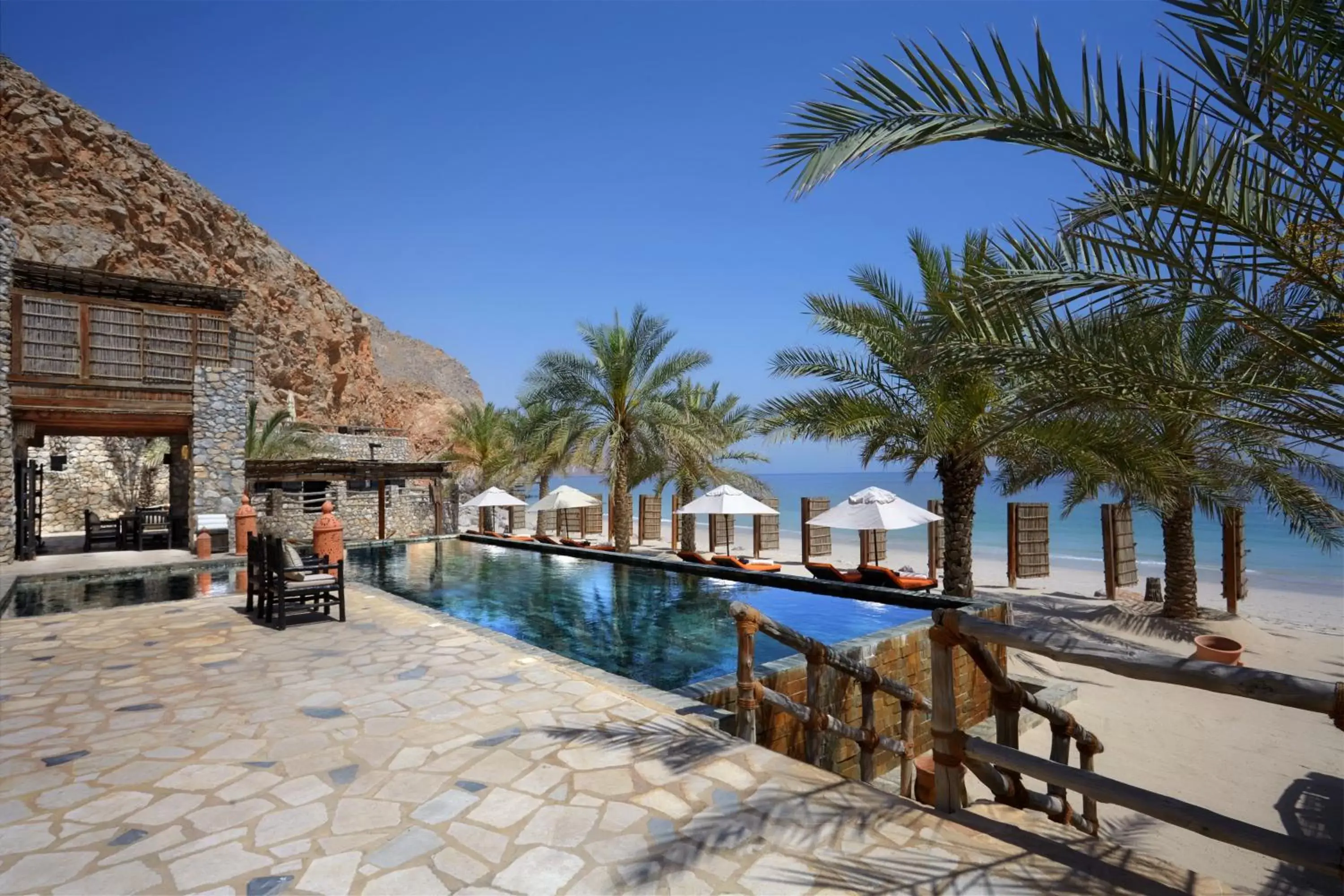 Patio, Swimming Pool in Six Senses Zighy Bay