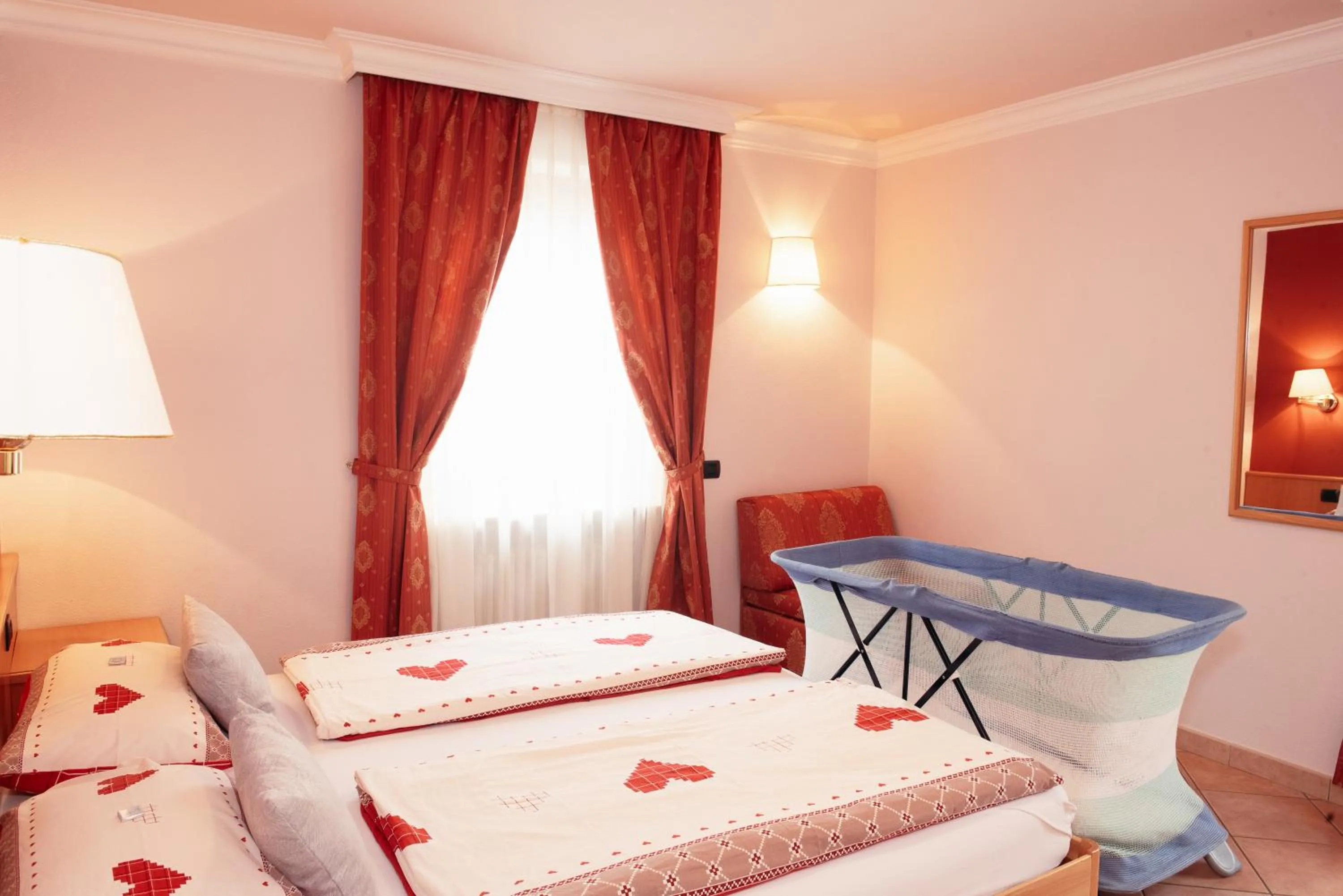 Bed in Hotel Garni Rin Da Rin