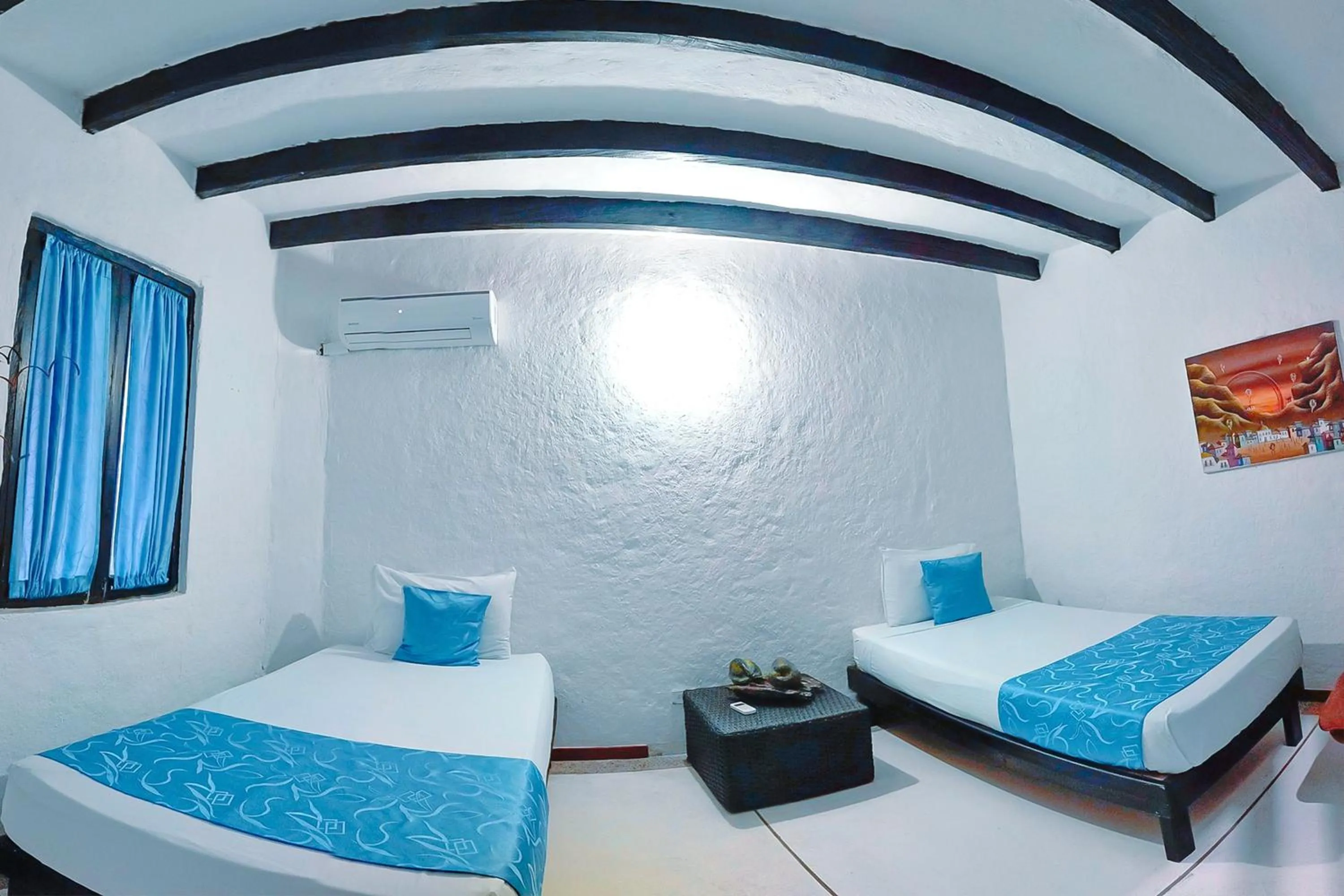 Twin Room in Hotel Sansiraka Suites By GEH Suites