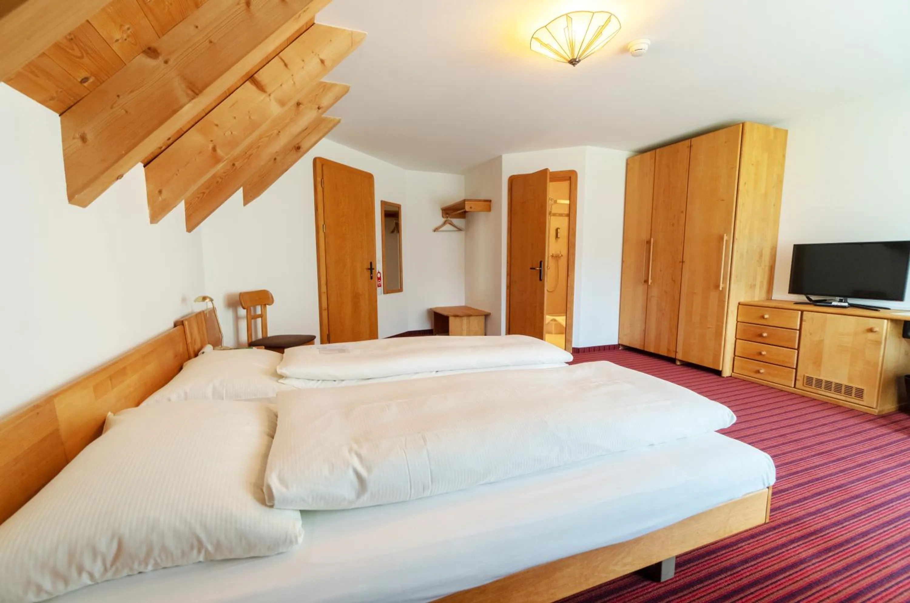 Bedroom, Bed in Typically Swiss Hotel Altana