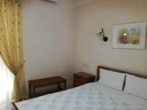 Bed in Hotel Triantafyllou
