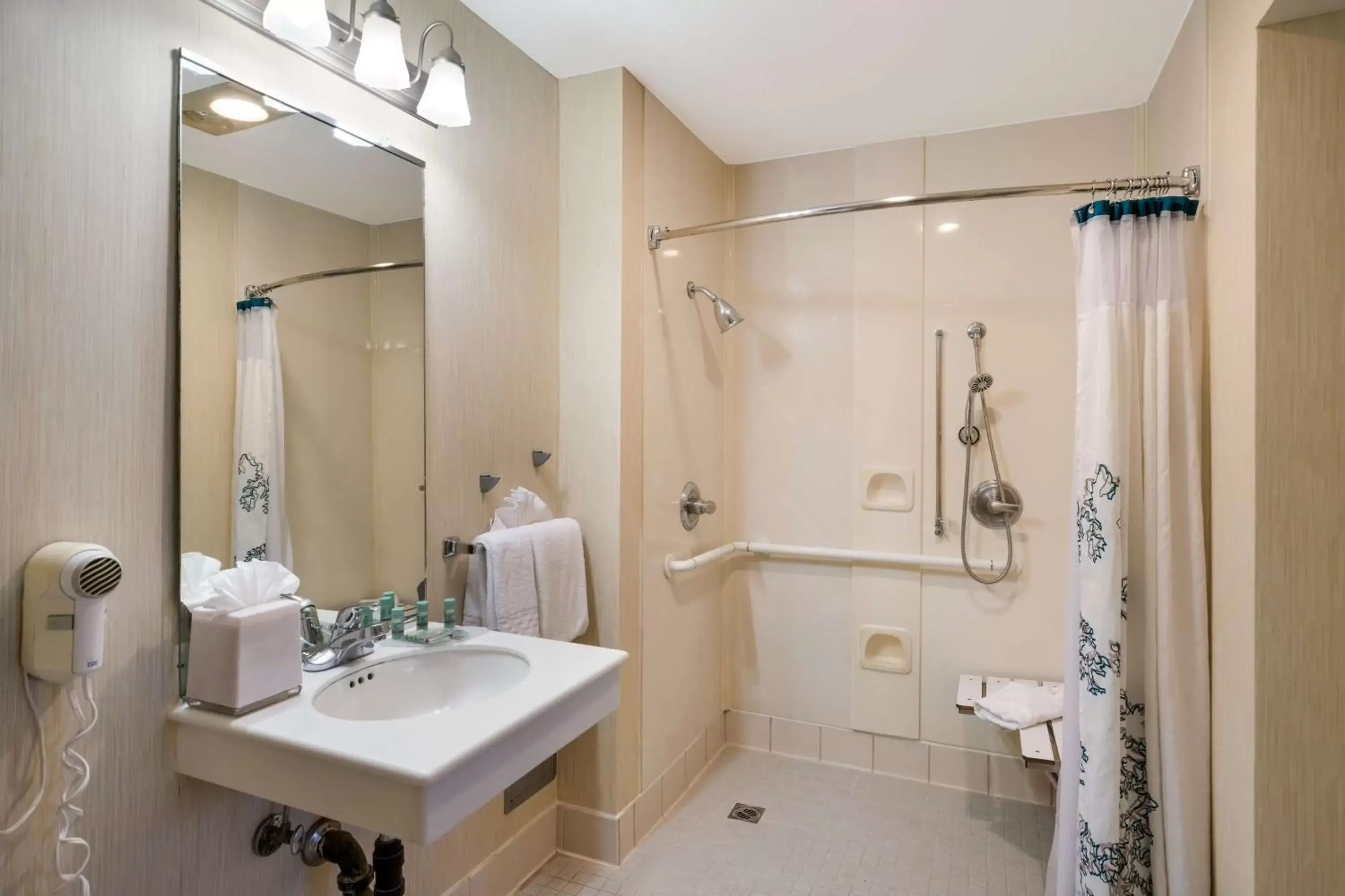 Bathroom in SenS Suites Livermore; SureStay Collection by Best Western