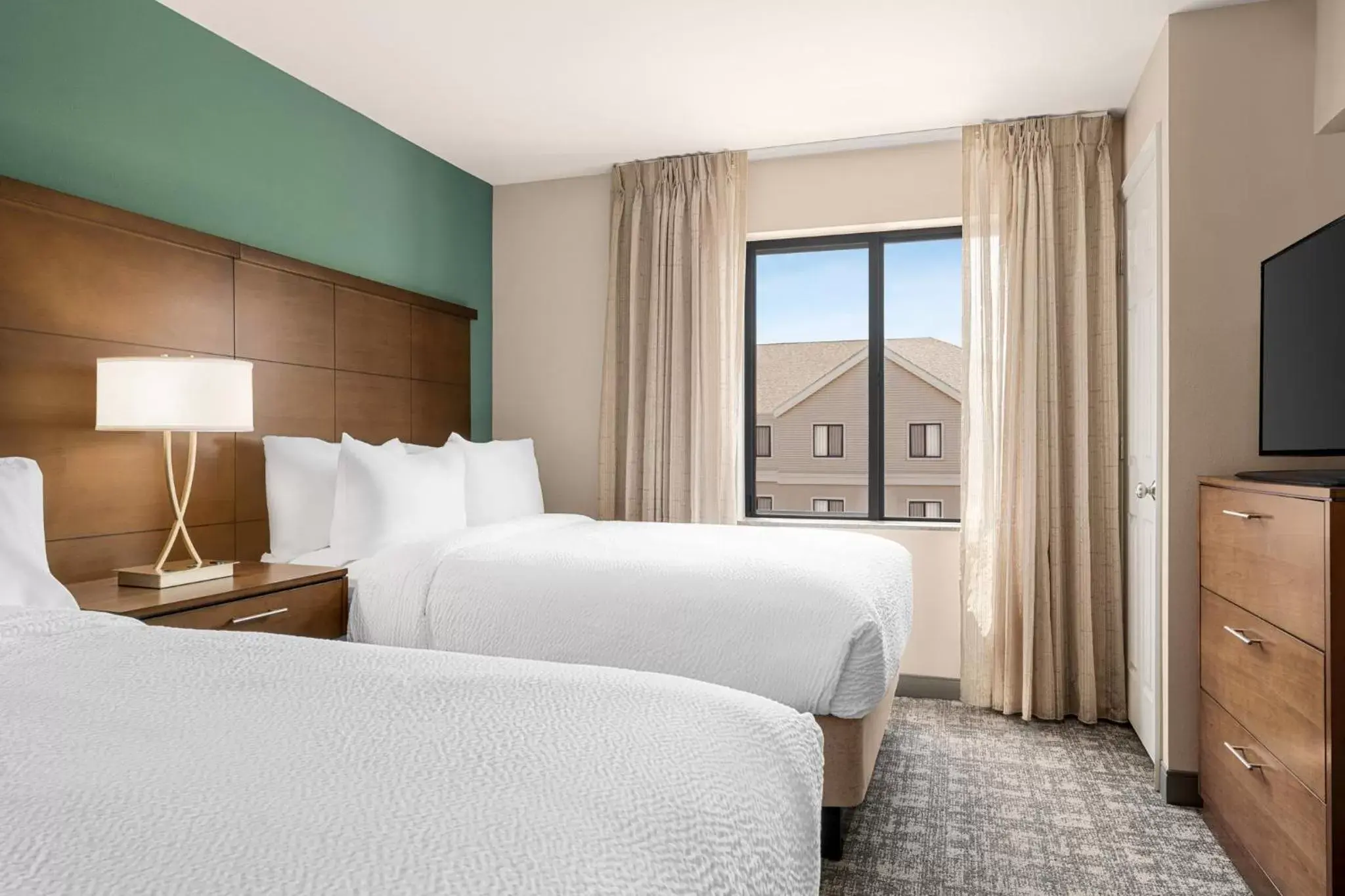 Photo of the whole room, Bed in Staybridge Suites Oklahoma City-Quail Springs, an IHG Hotel