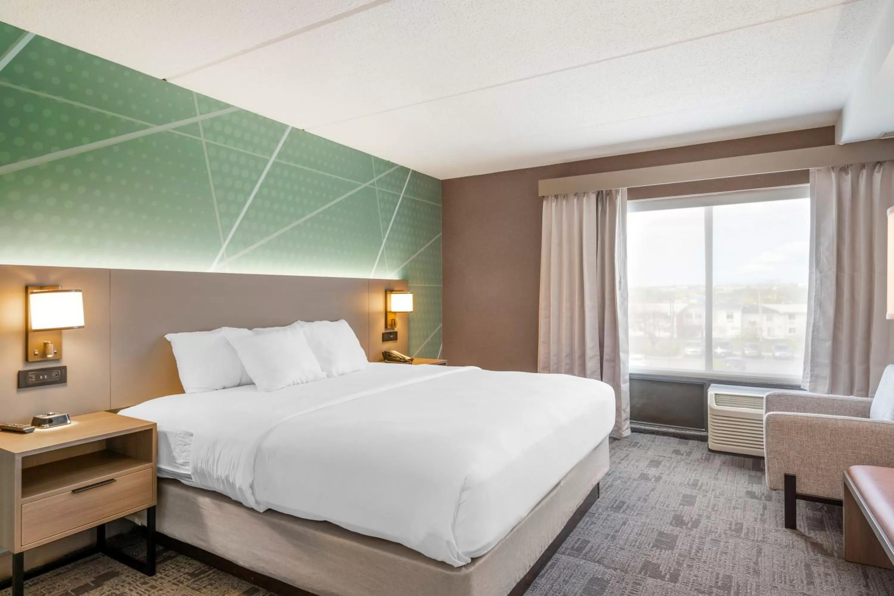 Bedroom, Bed in Comfort Inn & Suites Watertown - 1000 Islands