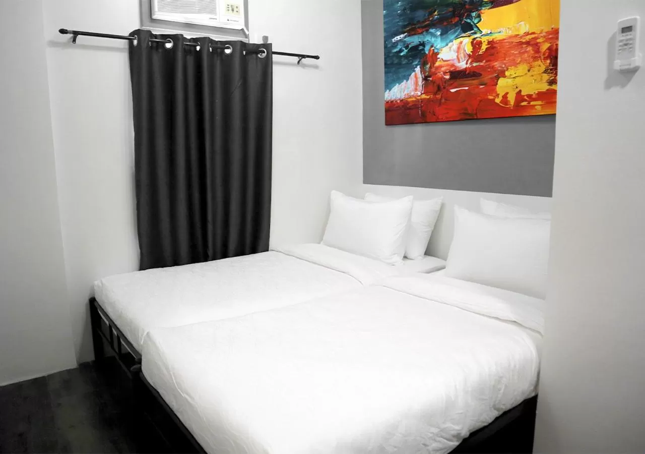 Bed in mySTAY Hotel BGC South