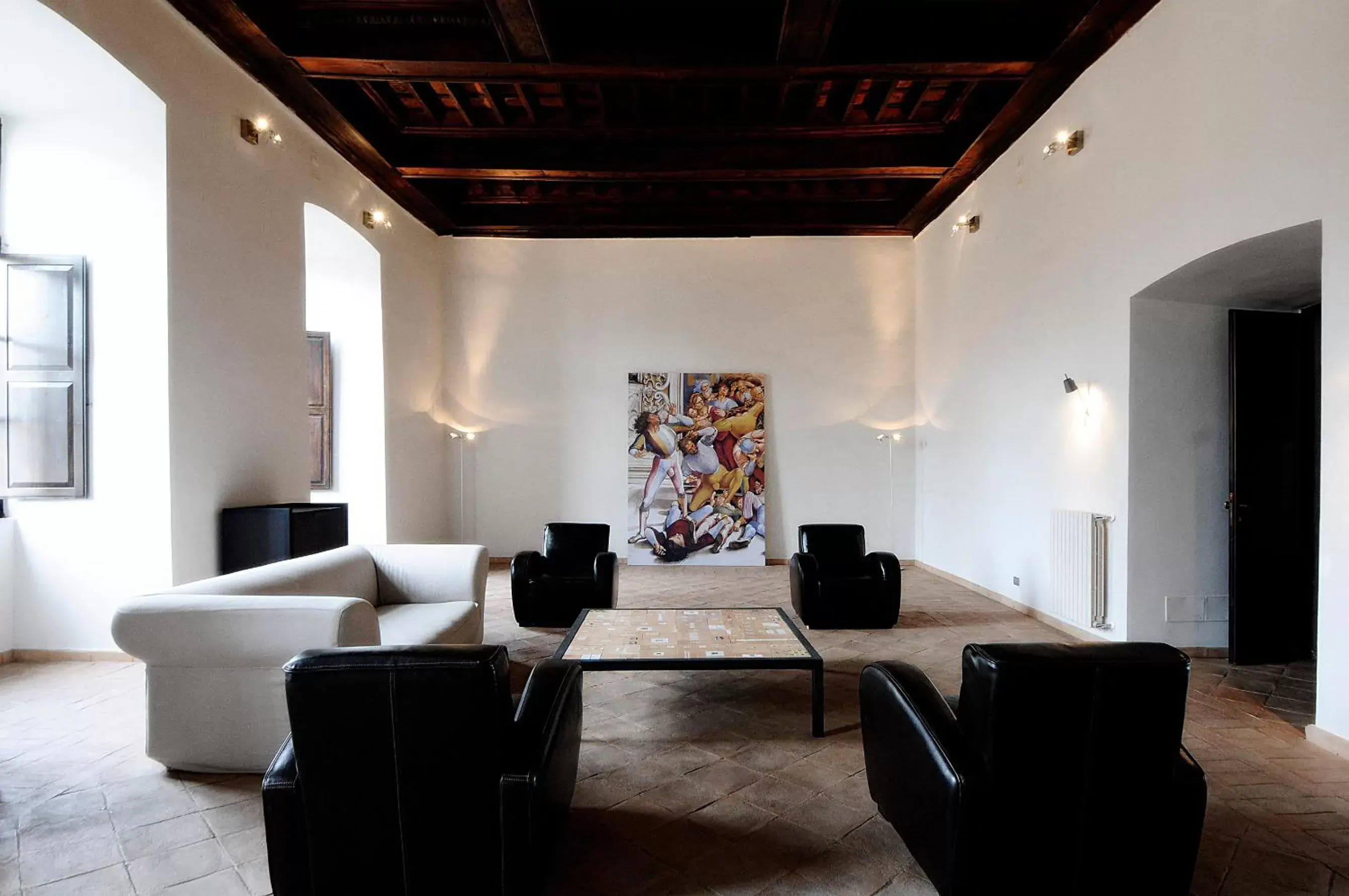 Seating area in Hotel Palazzo Piccolomini Seating area in Hotel Palazzo Piccolomini