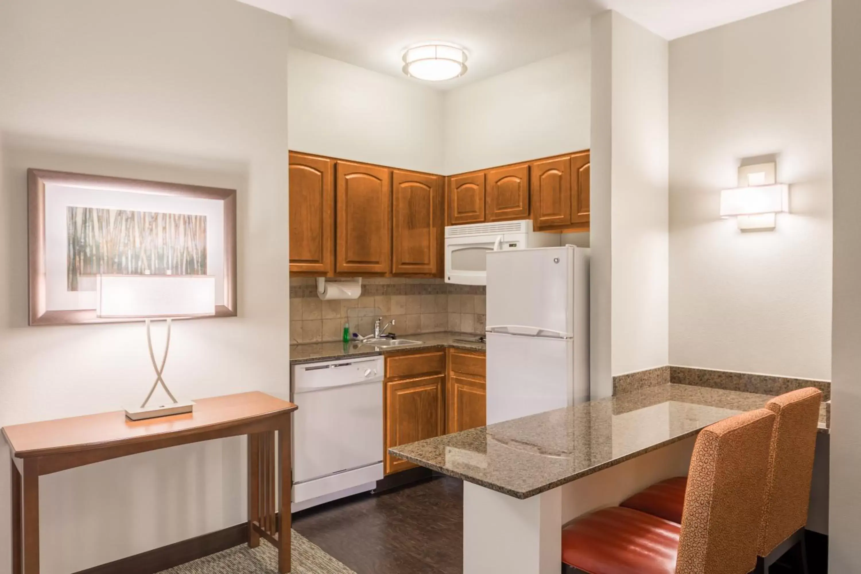 Photo of the whole room, Kitchen/Kitchenette in Staybridge Suites - Kansas City-Independence, an IHG Hotel