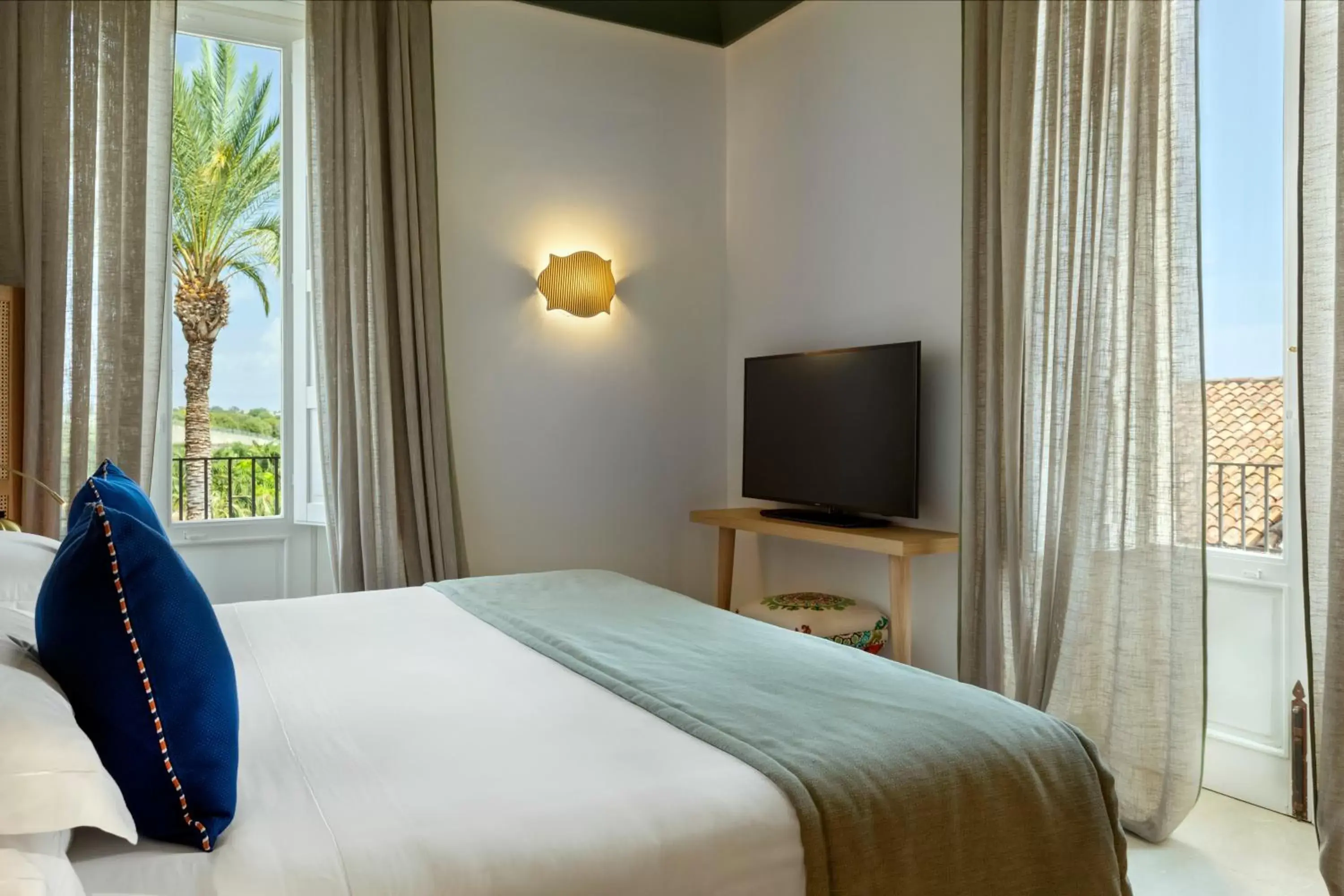 Bedroom, Bed in Donna Carmela Resort & Lodges