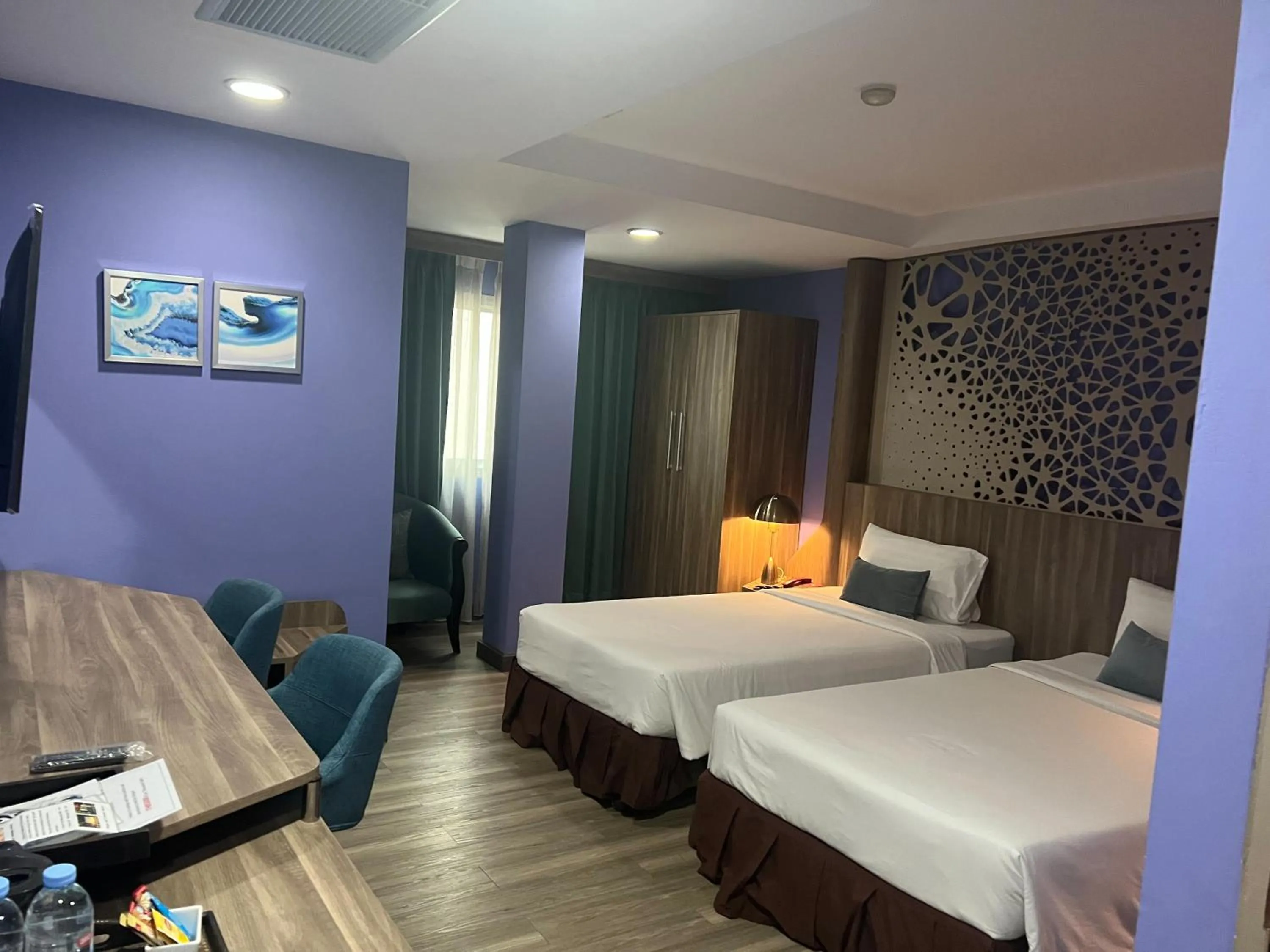 Bed in Grand Lucky Hotel