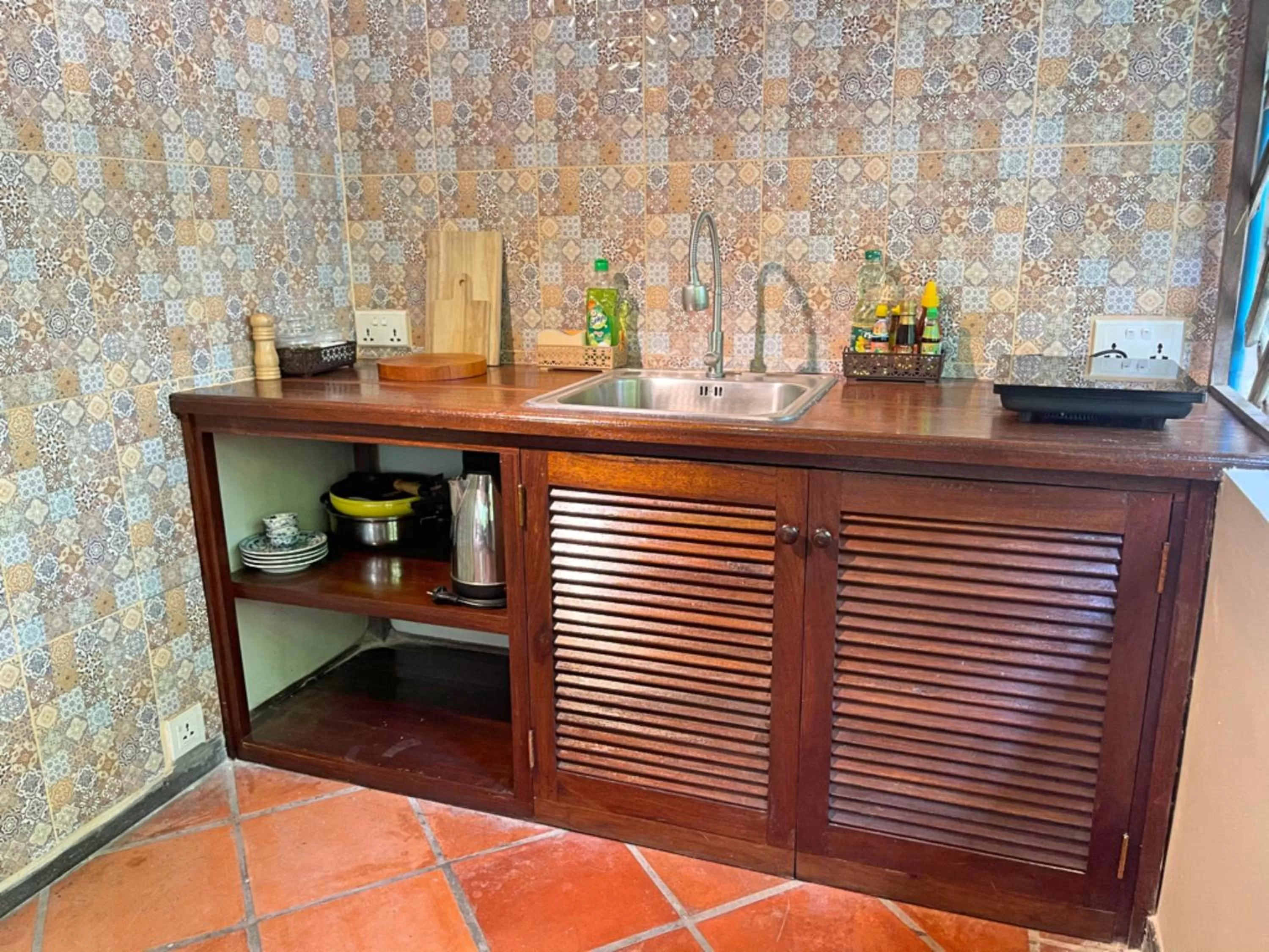 Kitchen or kitchenette in La Palmeraie D'angkor