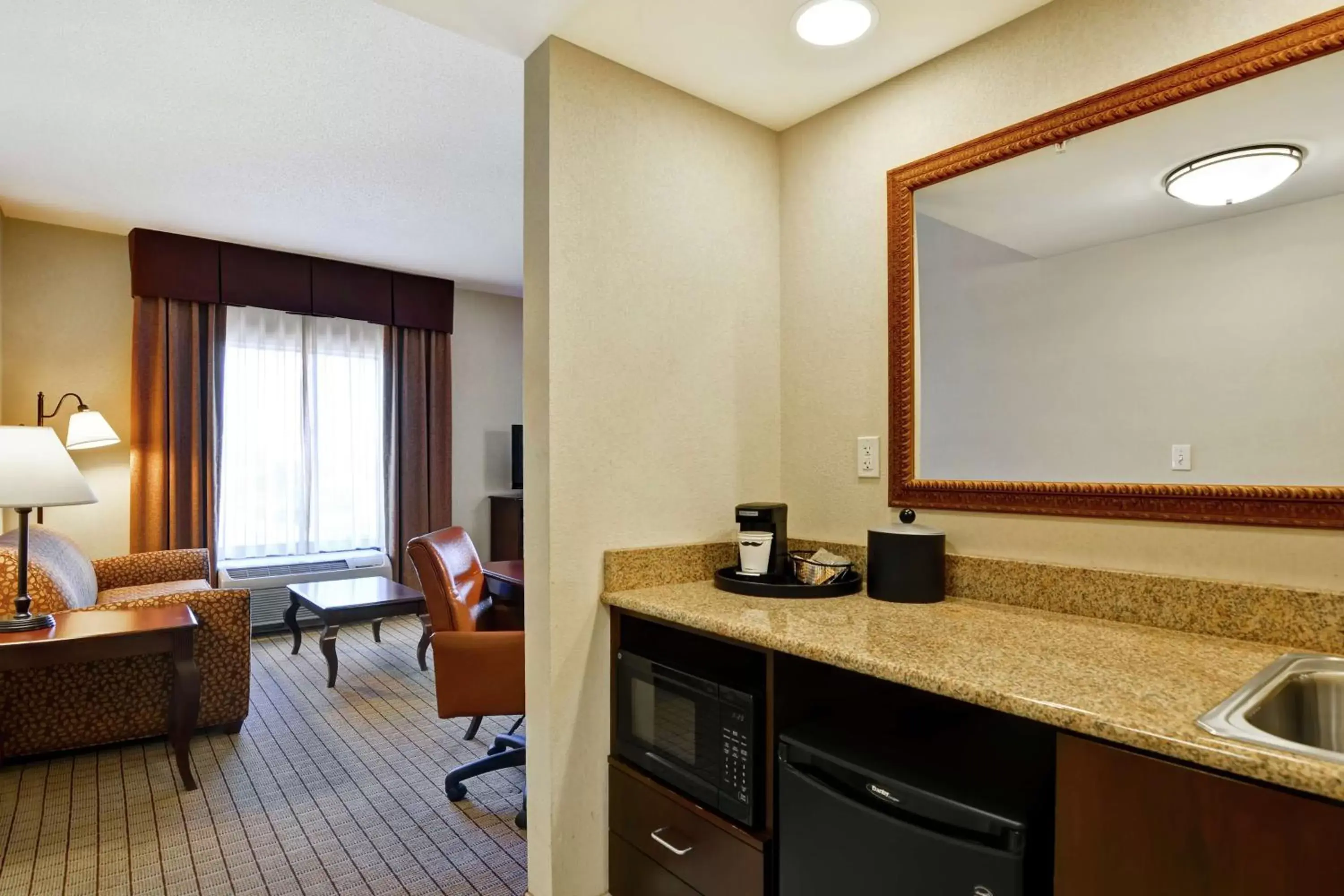 Living room, Bathroom in Hampton Inn and Suites Peoria at Grand Prairie