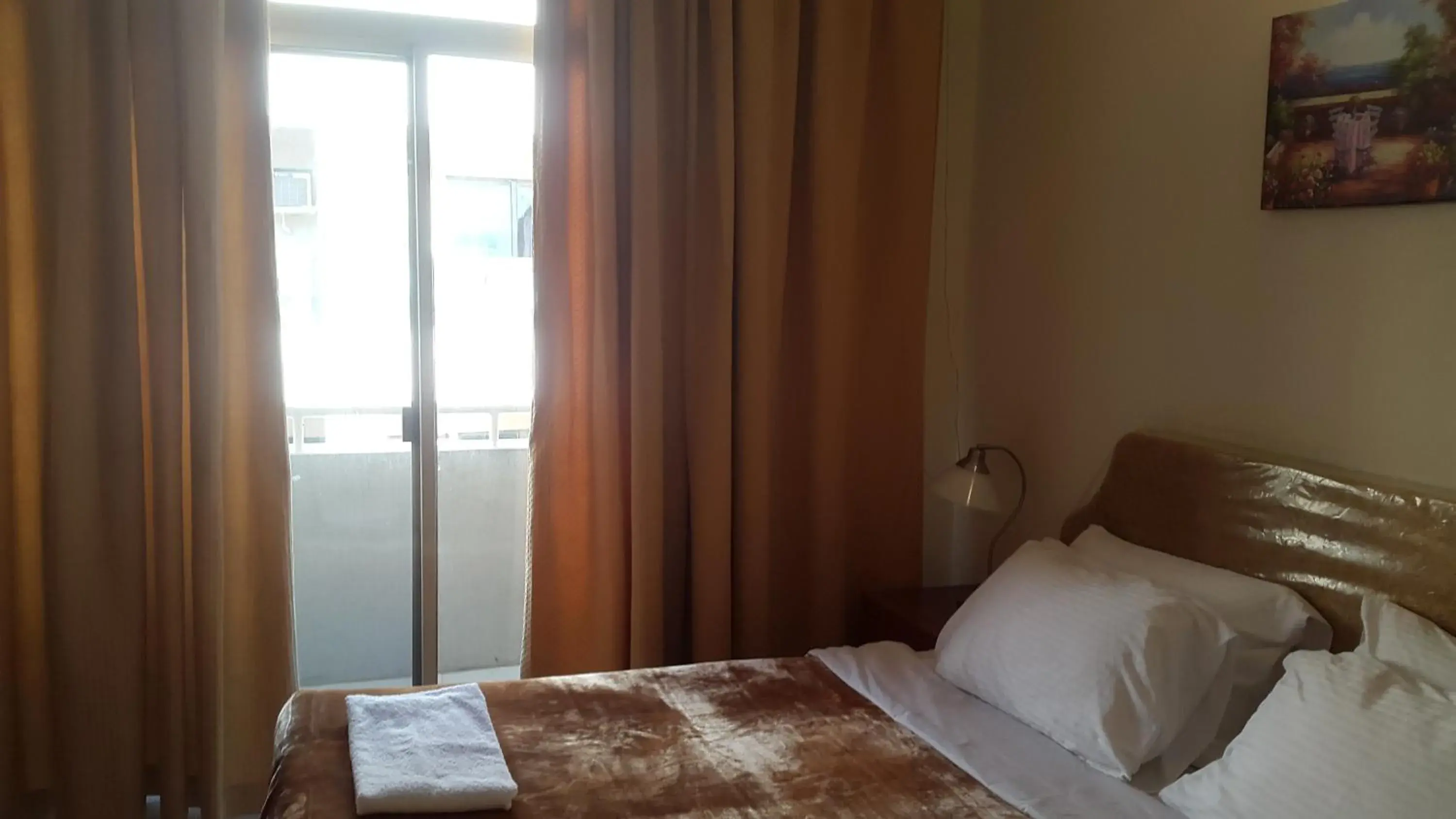 Balcony/Terrace, Bed in AL Raien Hotel Apartment