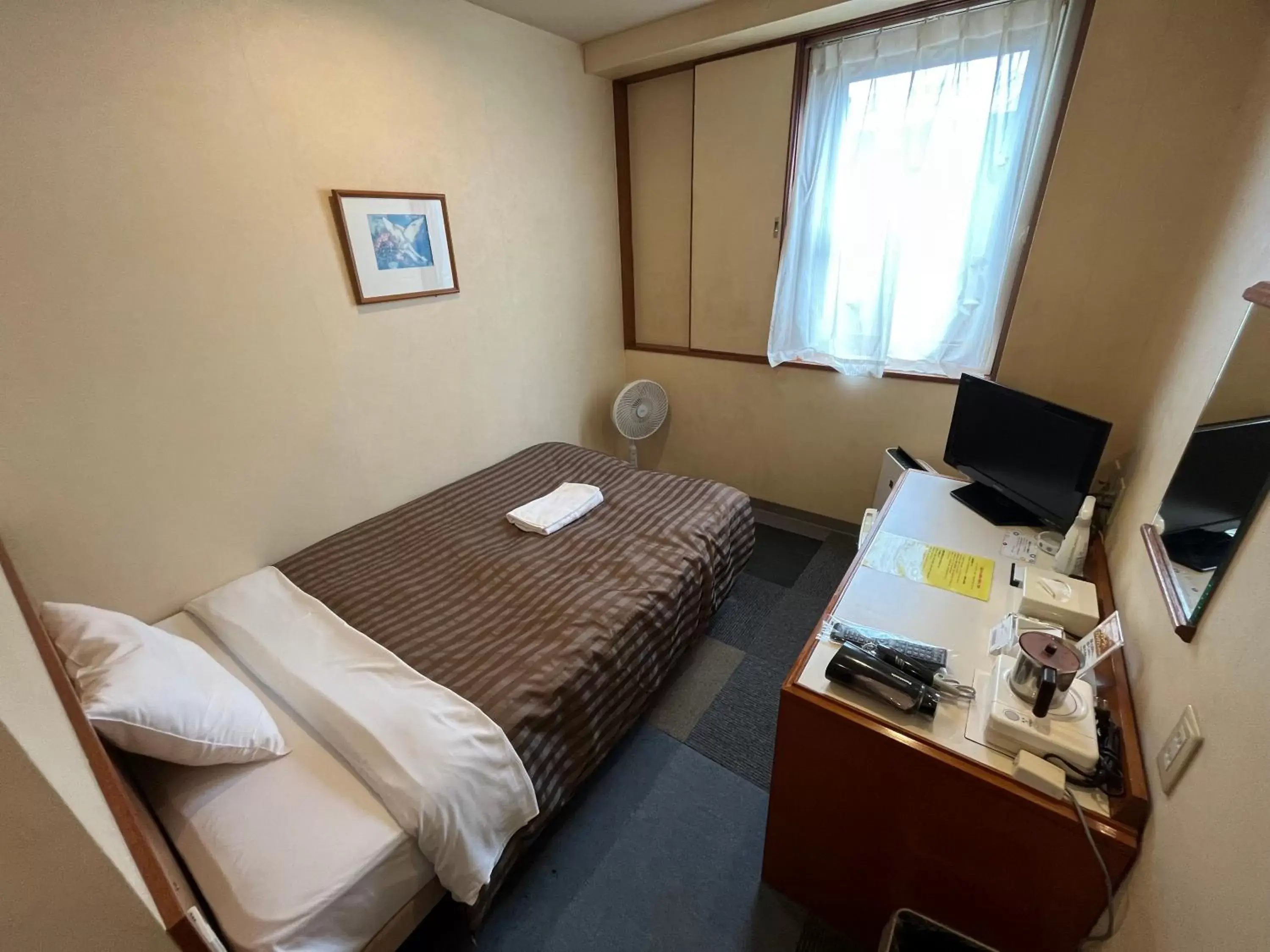 TV and multimedia, Bed in Hotel Axia Inn Kushiro