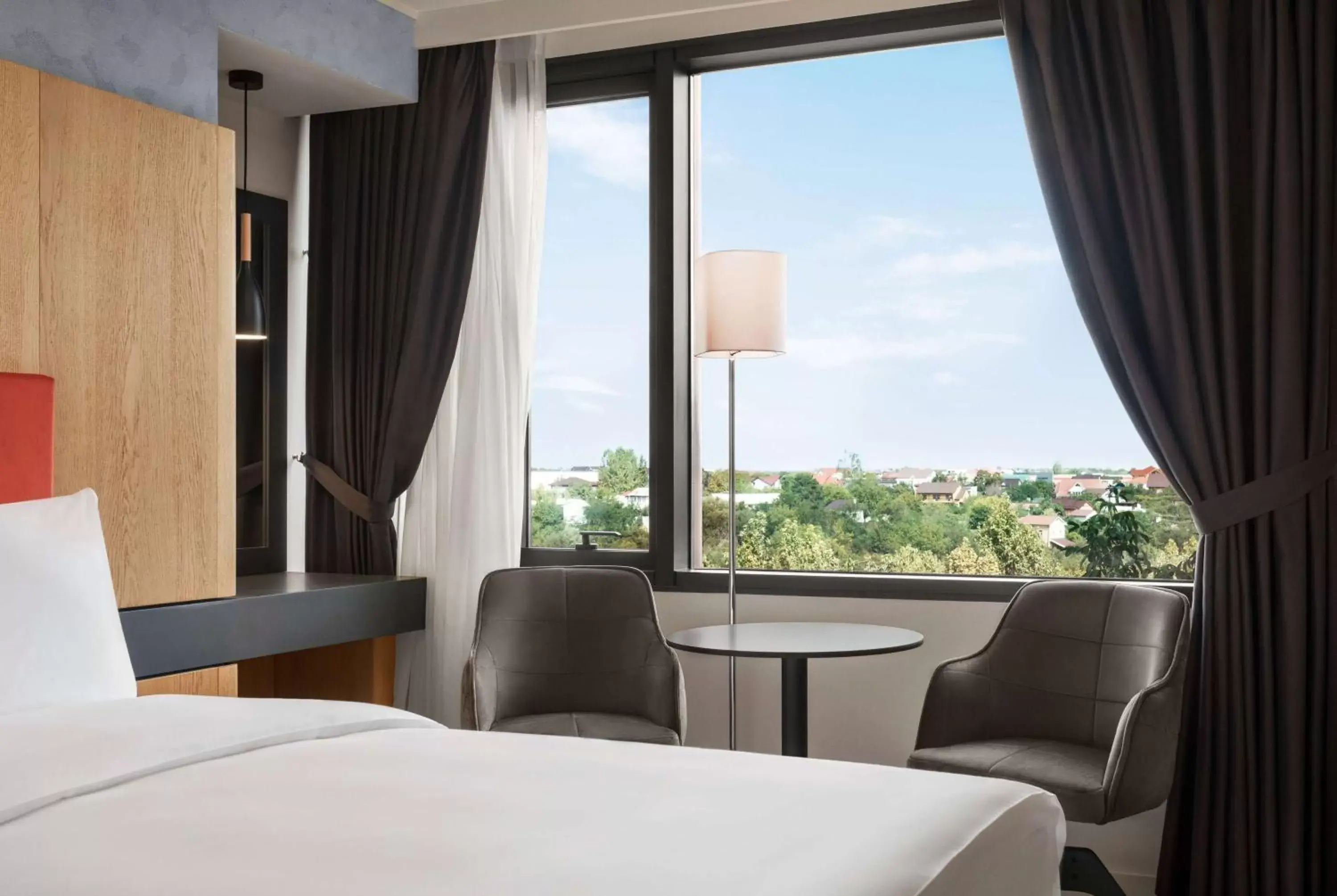 Bed in Ramada by Wyndham Slatina Parc