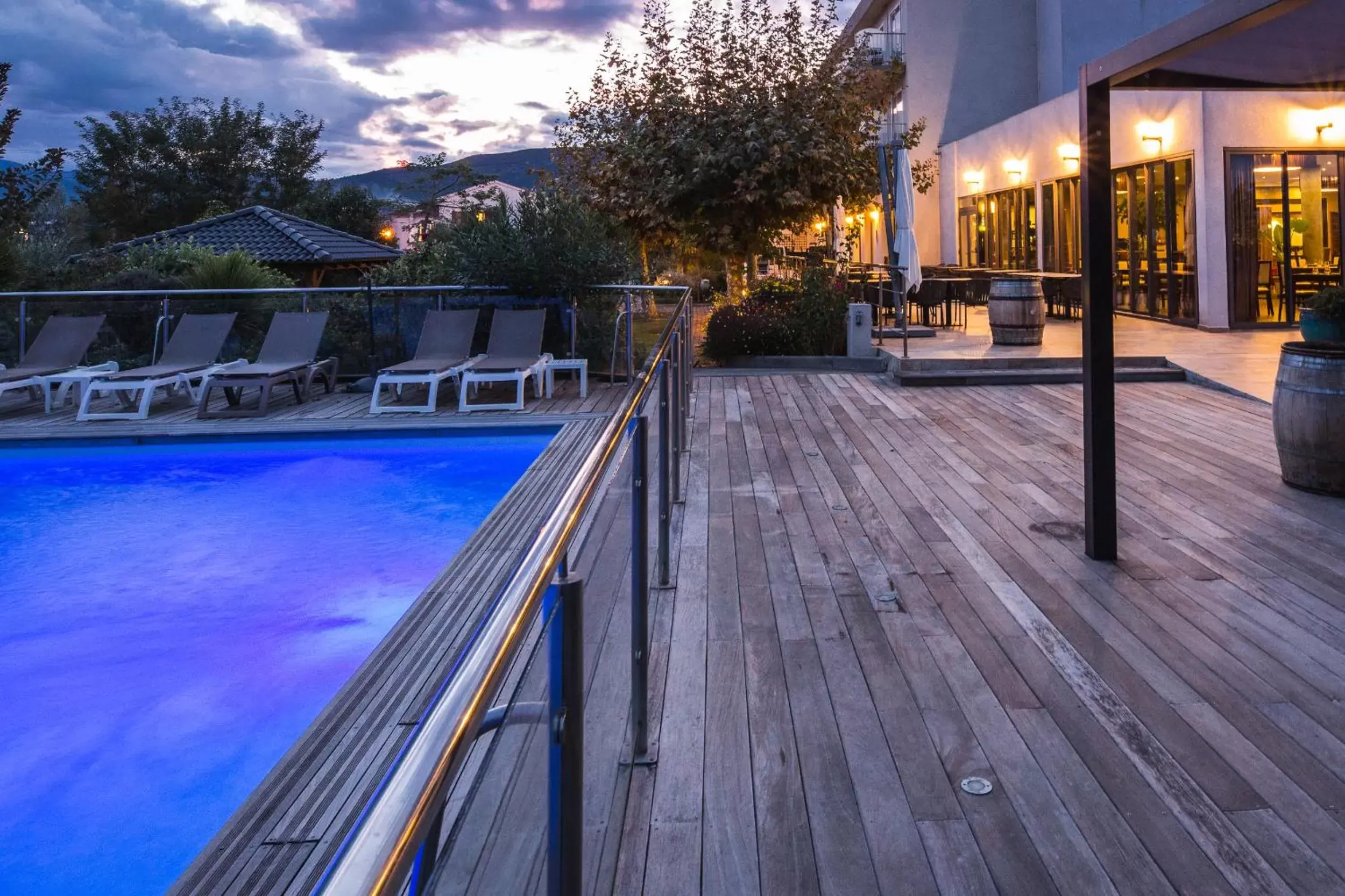 Swimming Pool in Hôtel Spa Restaurant La Madrague