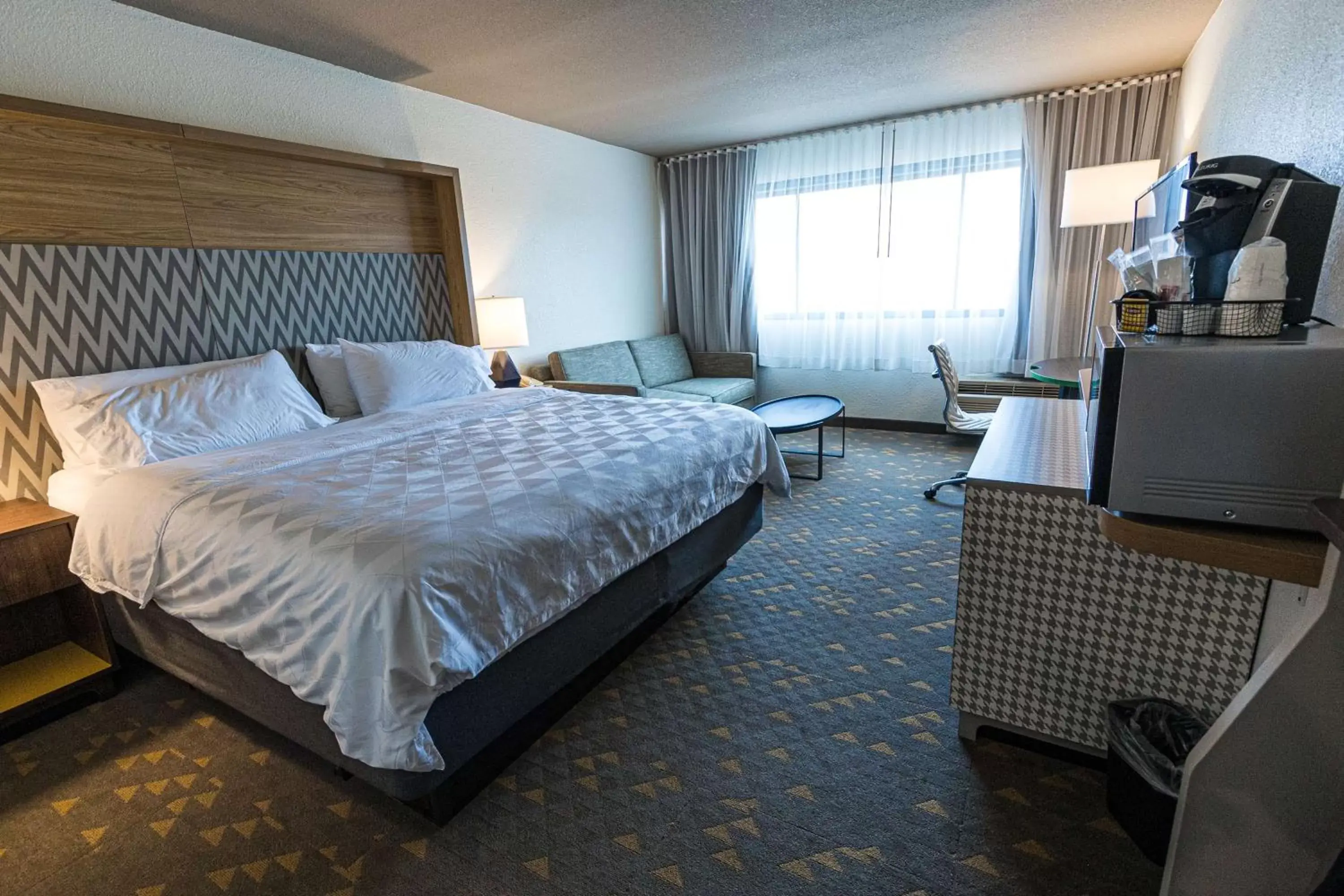 Bedroom in Gateway Hotel & Convention Center Best Western Premier Collection