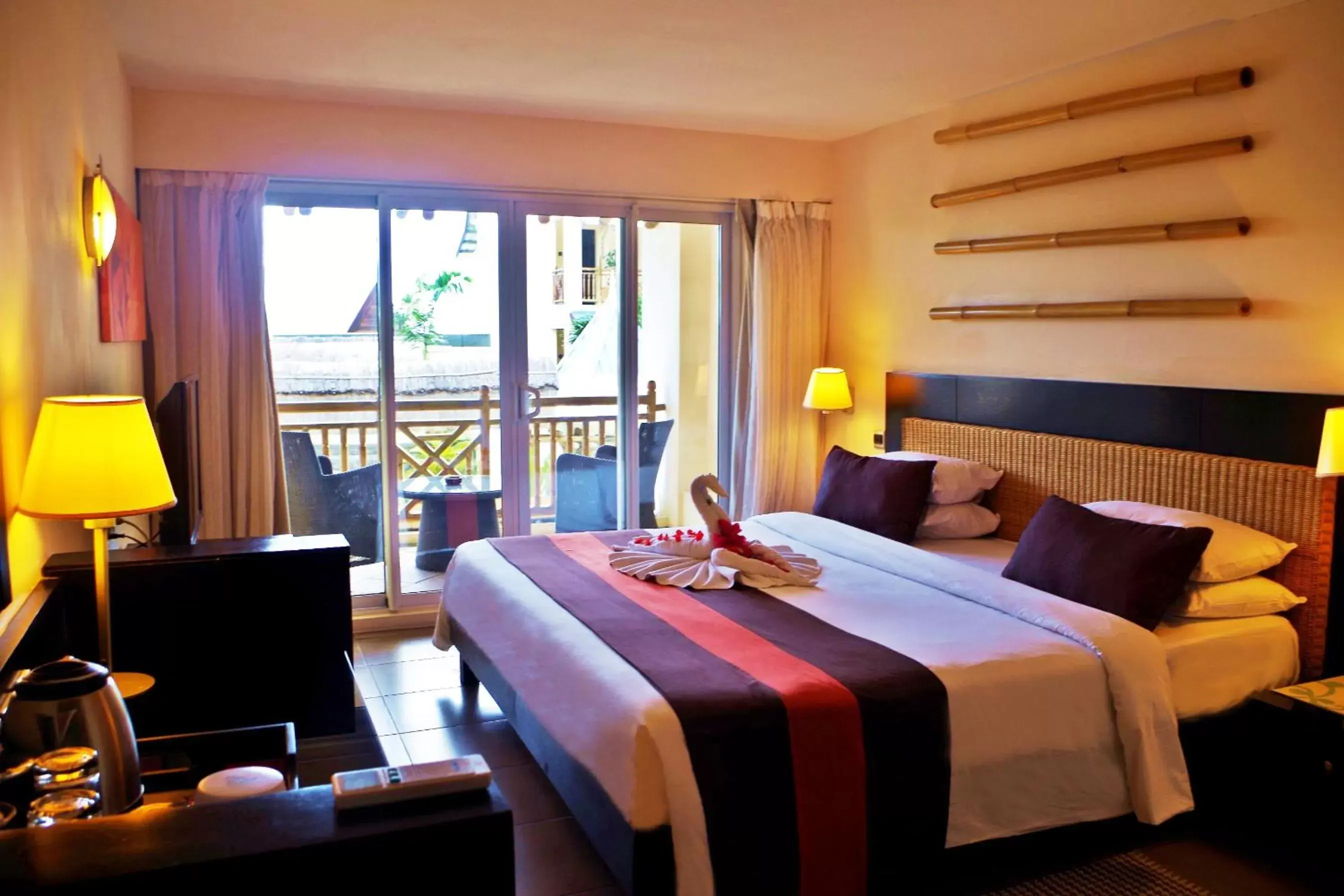 Bed in Pearle Beach Resort & Spa