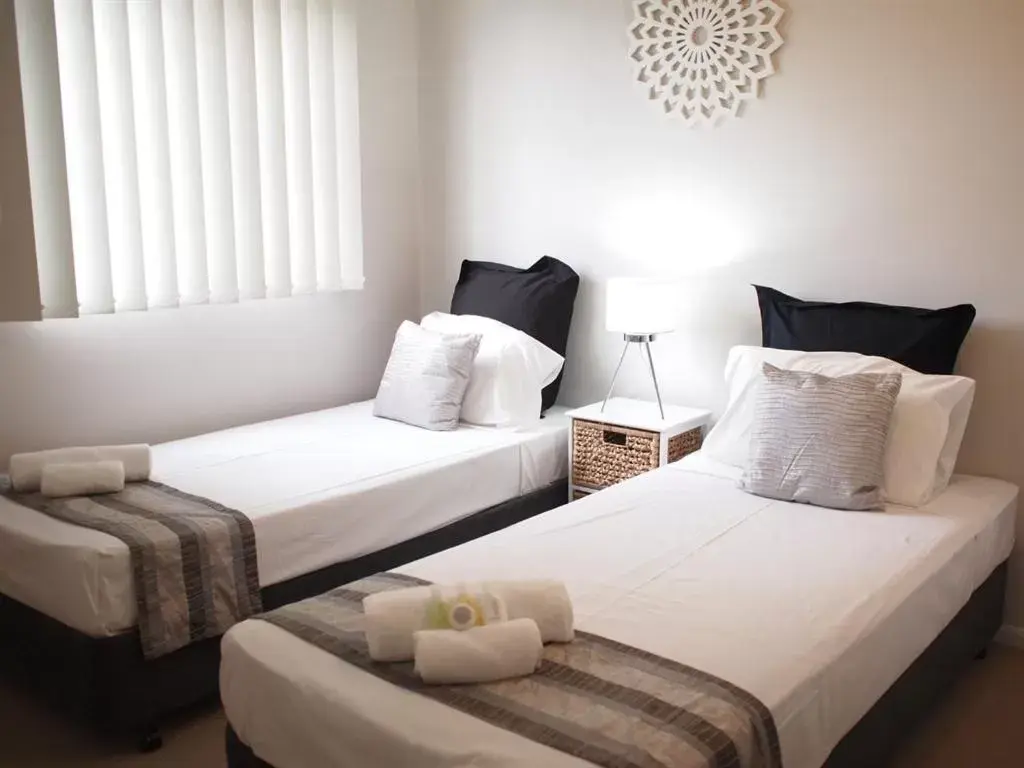 Bed in Edge Apartments Cairns