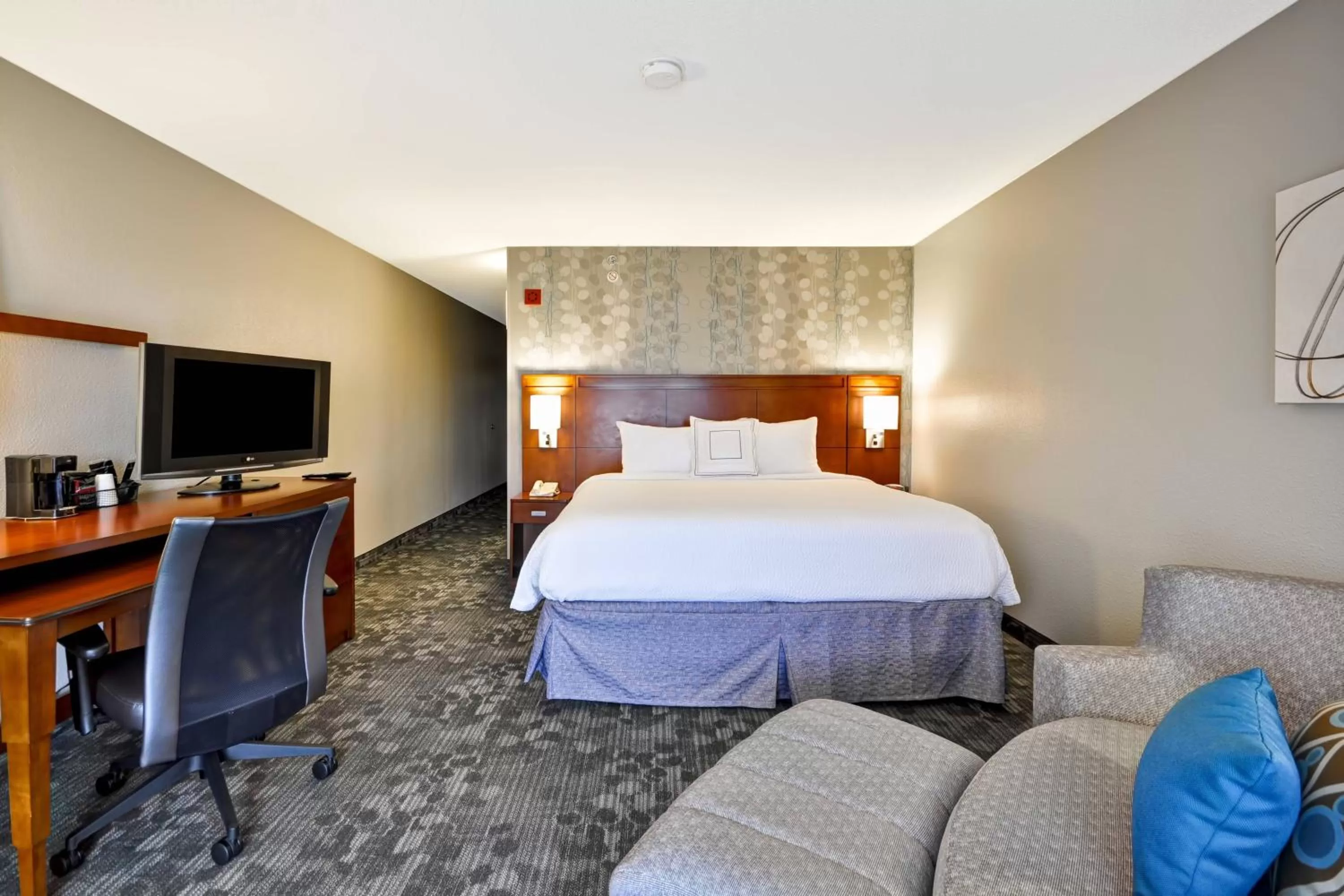Photo of the whole room, Bed in Courtyard by Marriott Jacksonville Airport/ Northeast