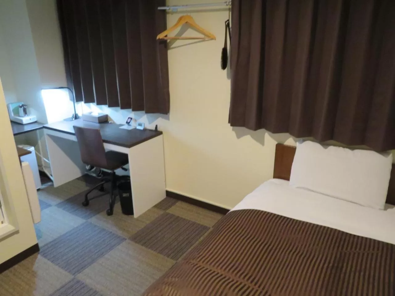 Bed in 釜石駅から徒歩5分ホテルマルエHotelMarue