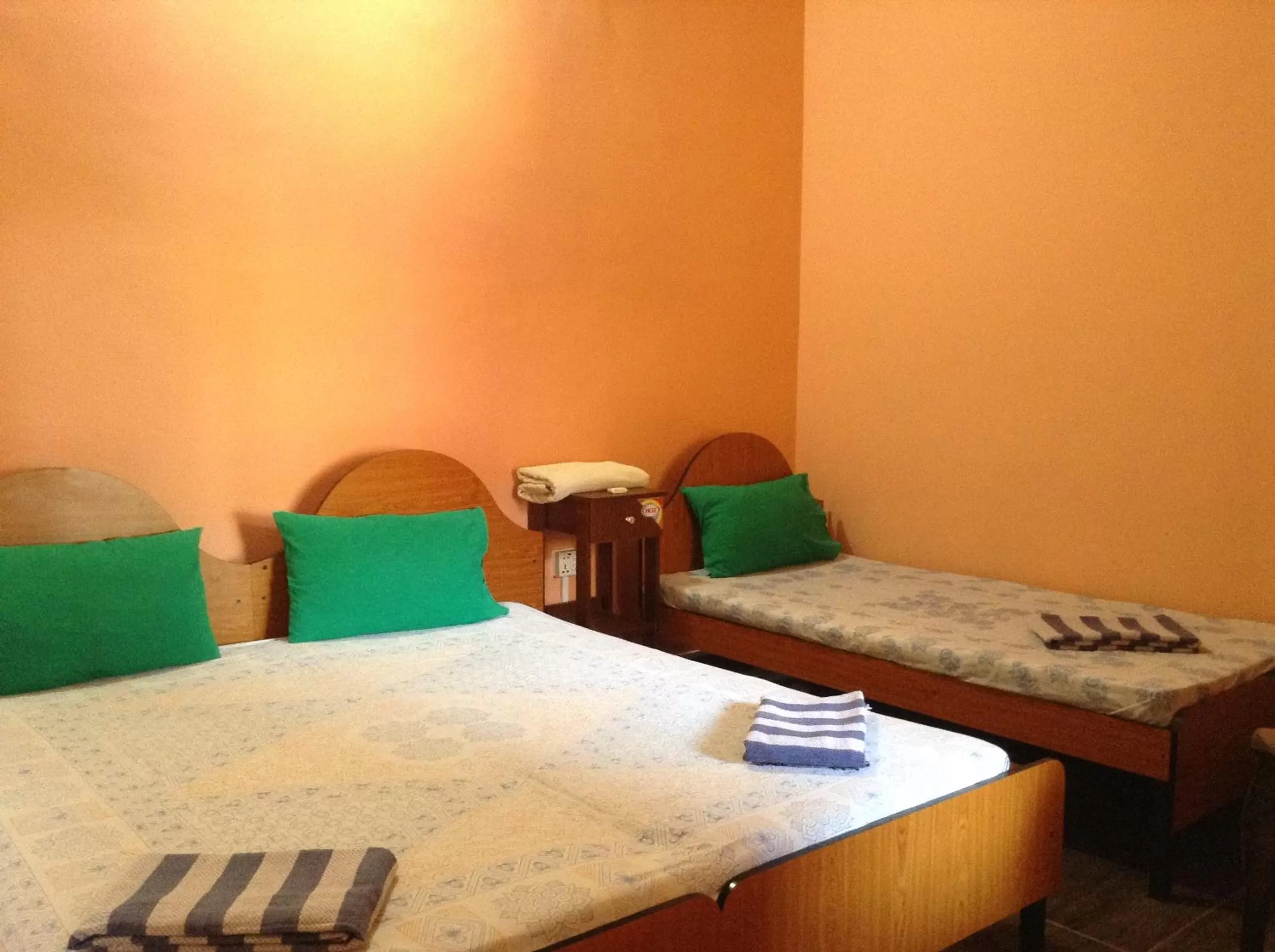 Bed in Sunshine Hotel