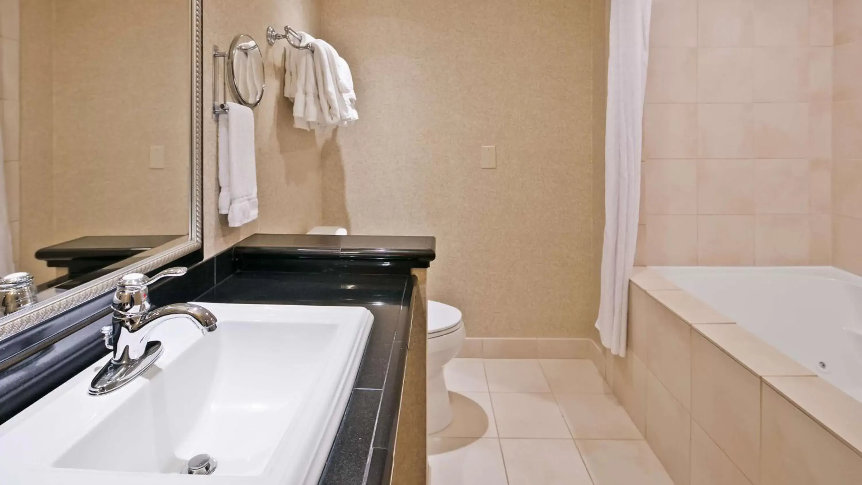 Bathroom in Best Western Premier Plaza Hotel and Conference Center