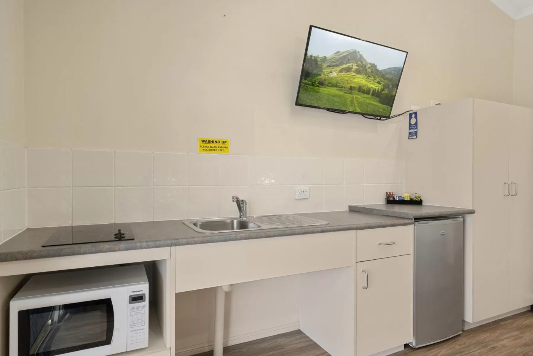 Kitchen or kitchenette in Caboolture Central Motor Inn, Sure Stay Collection by BW