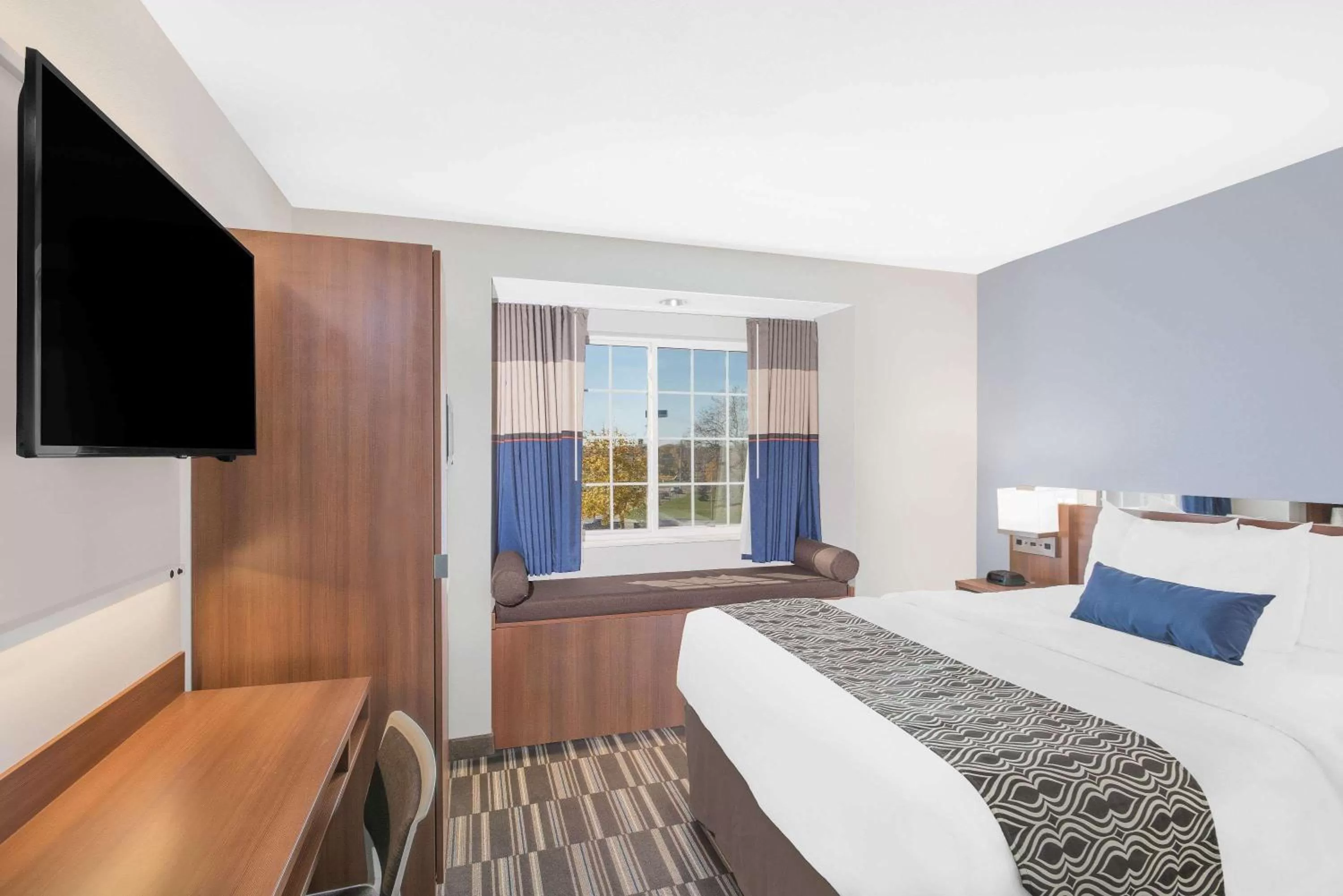 Photo of the whole room, Bed in Microtel Inn & Suites by Wyndham Binghamton