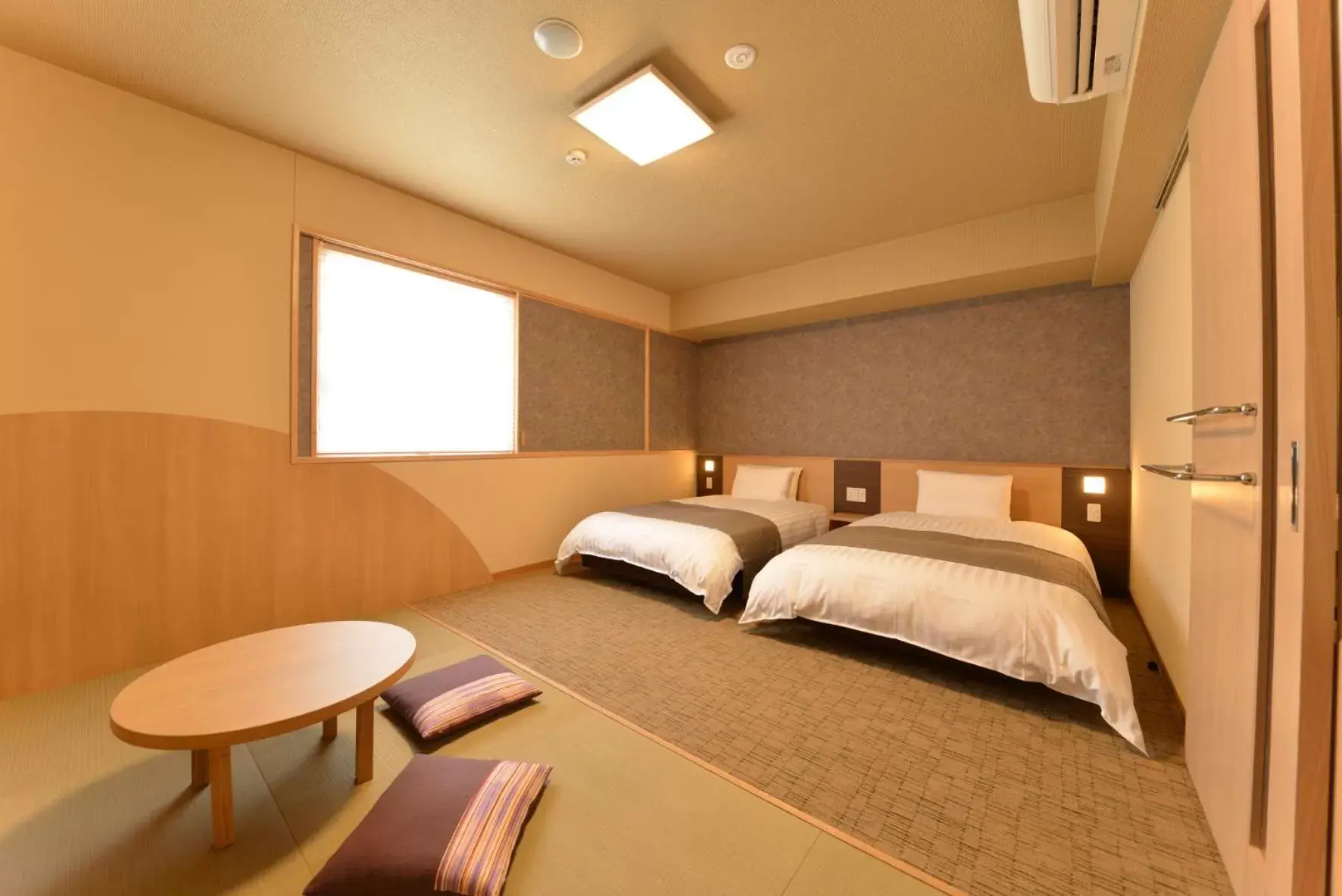Bed in Dormy Inn Takamatsu Chuo Koenmae Natural Hot Spring