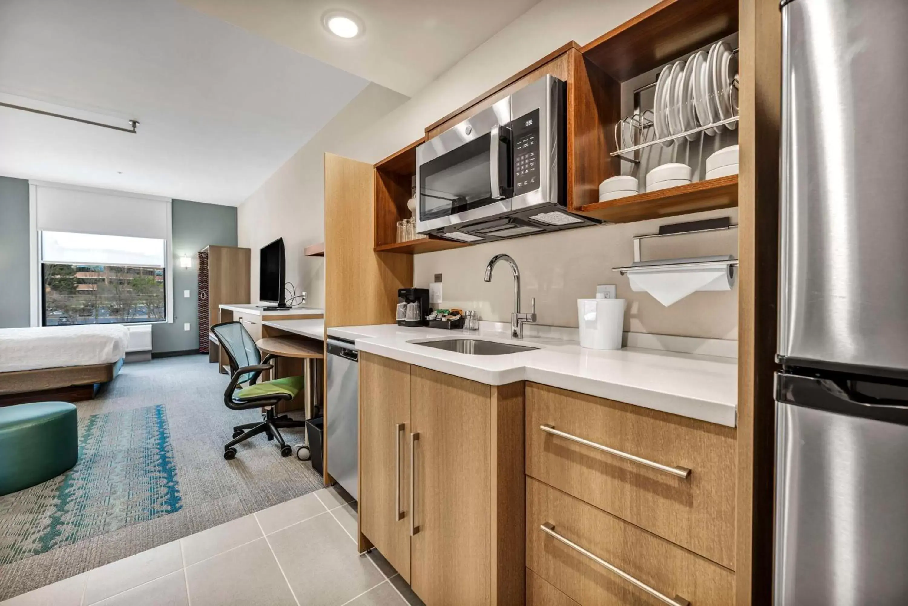 Bedroom, Kitchen/Kitchenette in Home2 Suites By Hilton Raleigh State Arena