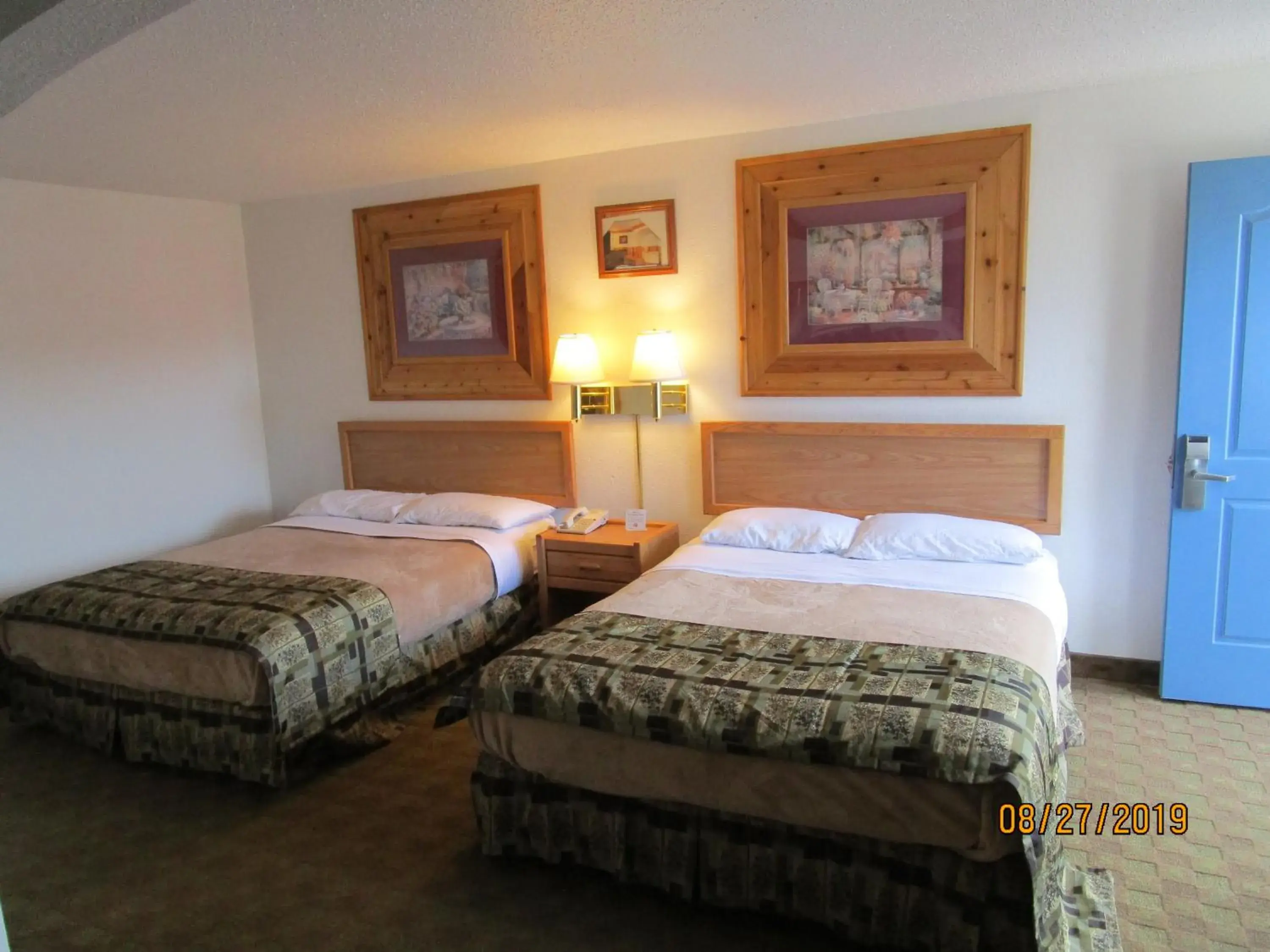 Bed in North Country Inn And Suites